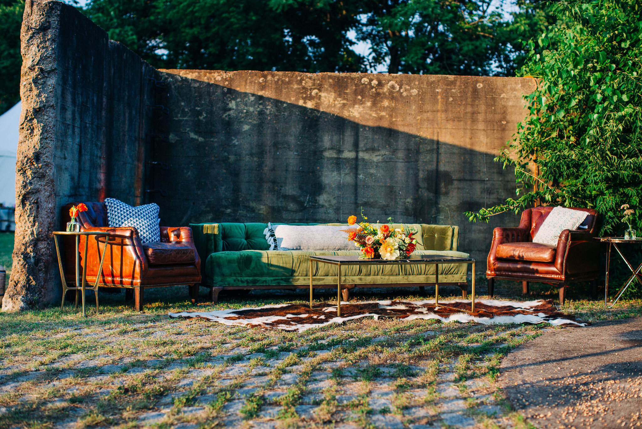 Rust orange, terra cotta, and golden yellow floral centerpieces for the CMT Songbird Supper Club 2019. Nashville event florist.