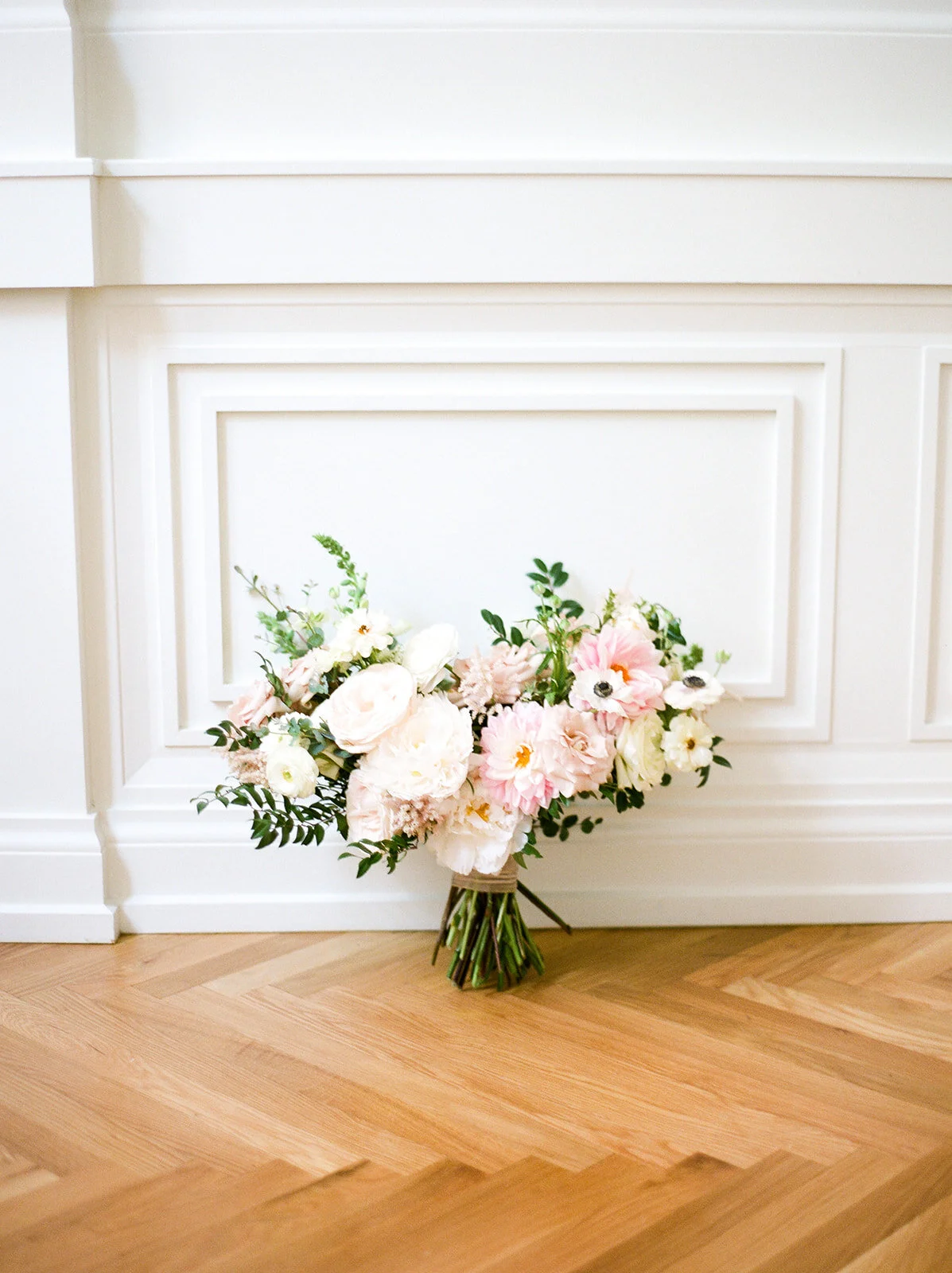 Blush, ivory, and greenery bridal bouquet with dahlias, garden roses, peonies, and anemones. Nashville wedding florist, Rosemary and Finch.