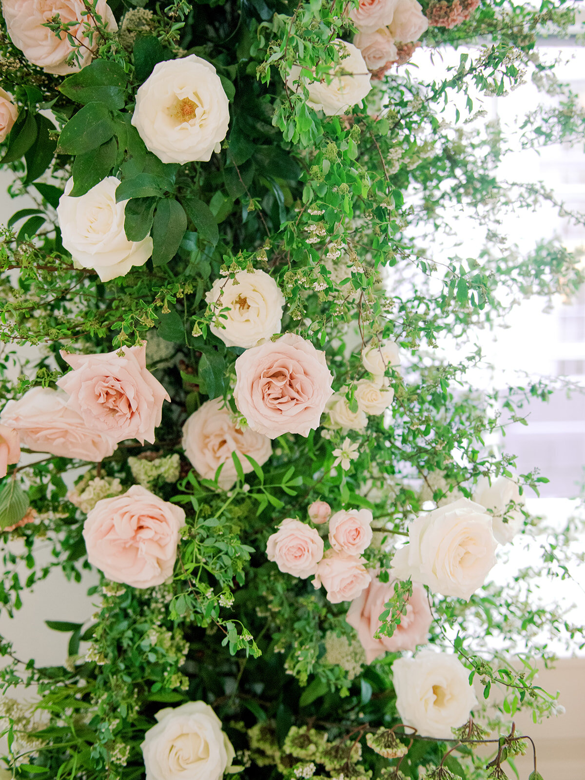 Organic greenery installation for downtown Nashville wedding at the Noelle. Wedding Floral Designer, Rosemary and Finch.