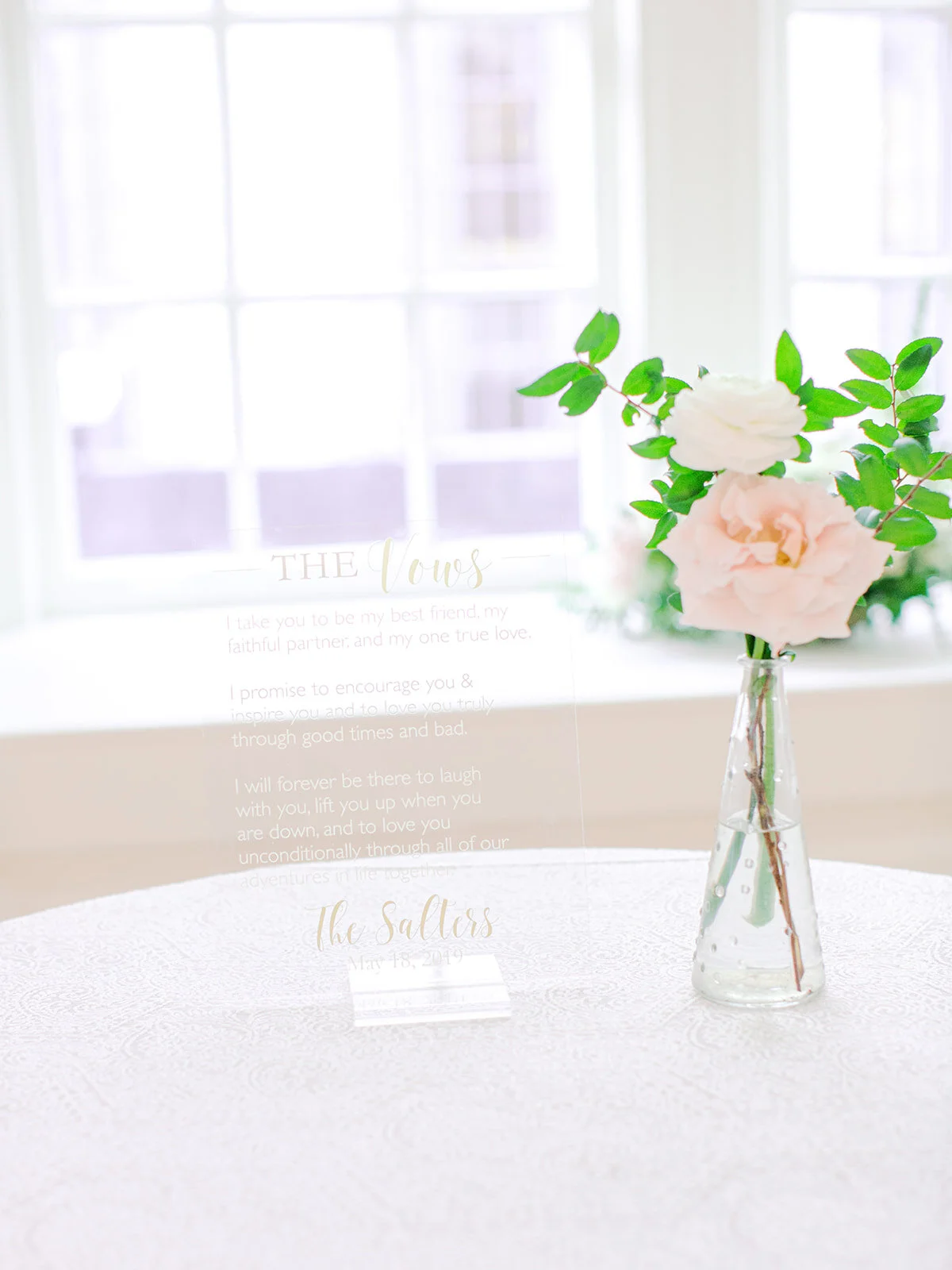 Blush garden roses, white ranunculus, and garden-inspired greenery. Organic wedding floral design at the Noelle in Nashville.