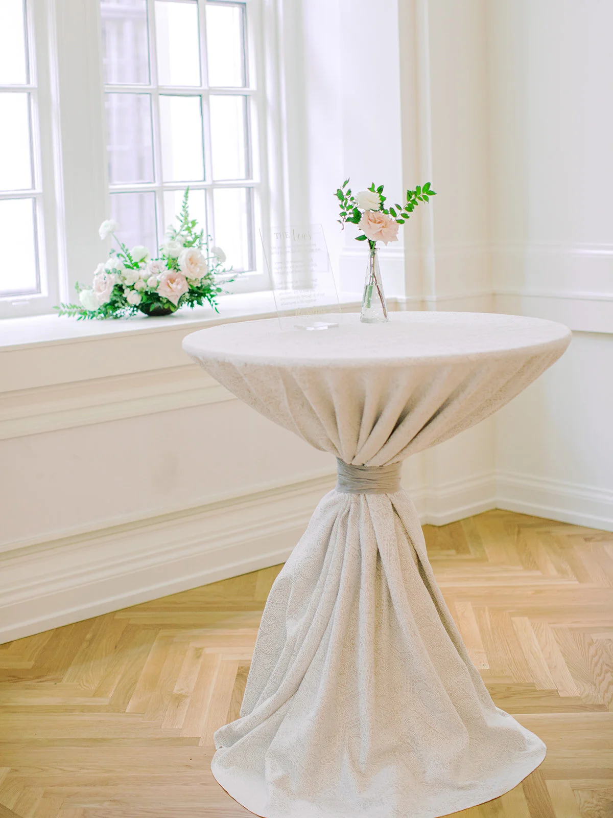 Blush garden roses, white ranunculus, and garden-inspired greenery. Organic wedding floral design at the Noelle in Nashville.