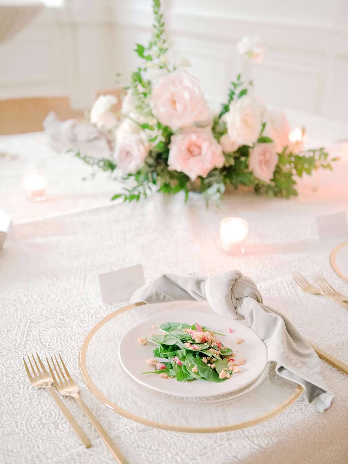 Blush garden roses, white ranunculus, and garden-inspired greenery. Organic wedding floral design at the Noelle in Nashville.