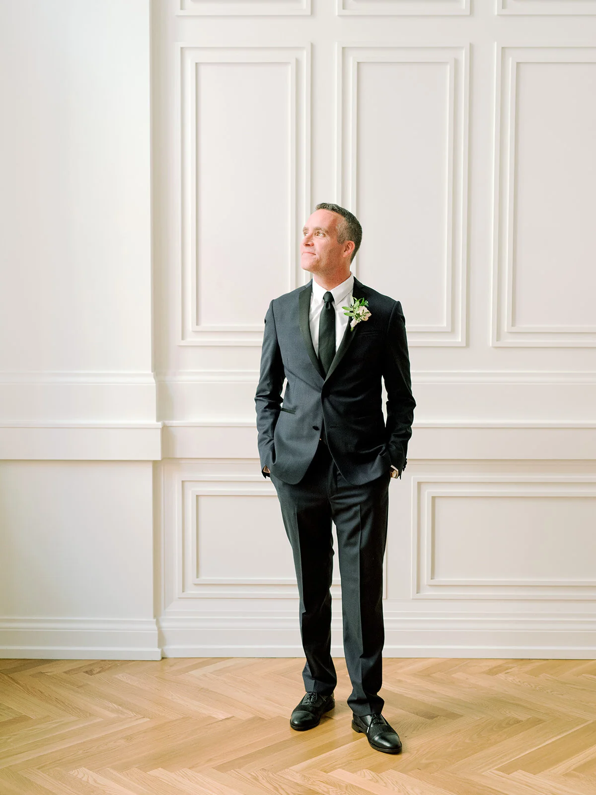 Blush and ivory groom’s boutonniere with texture and natural greenery. Nashville wedding florist.