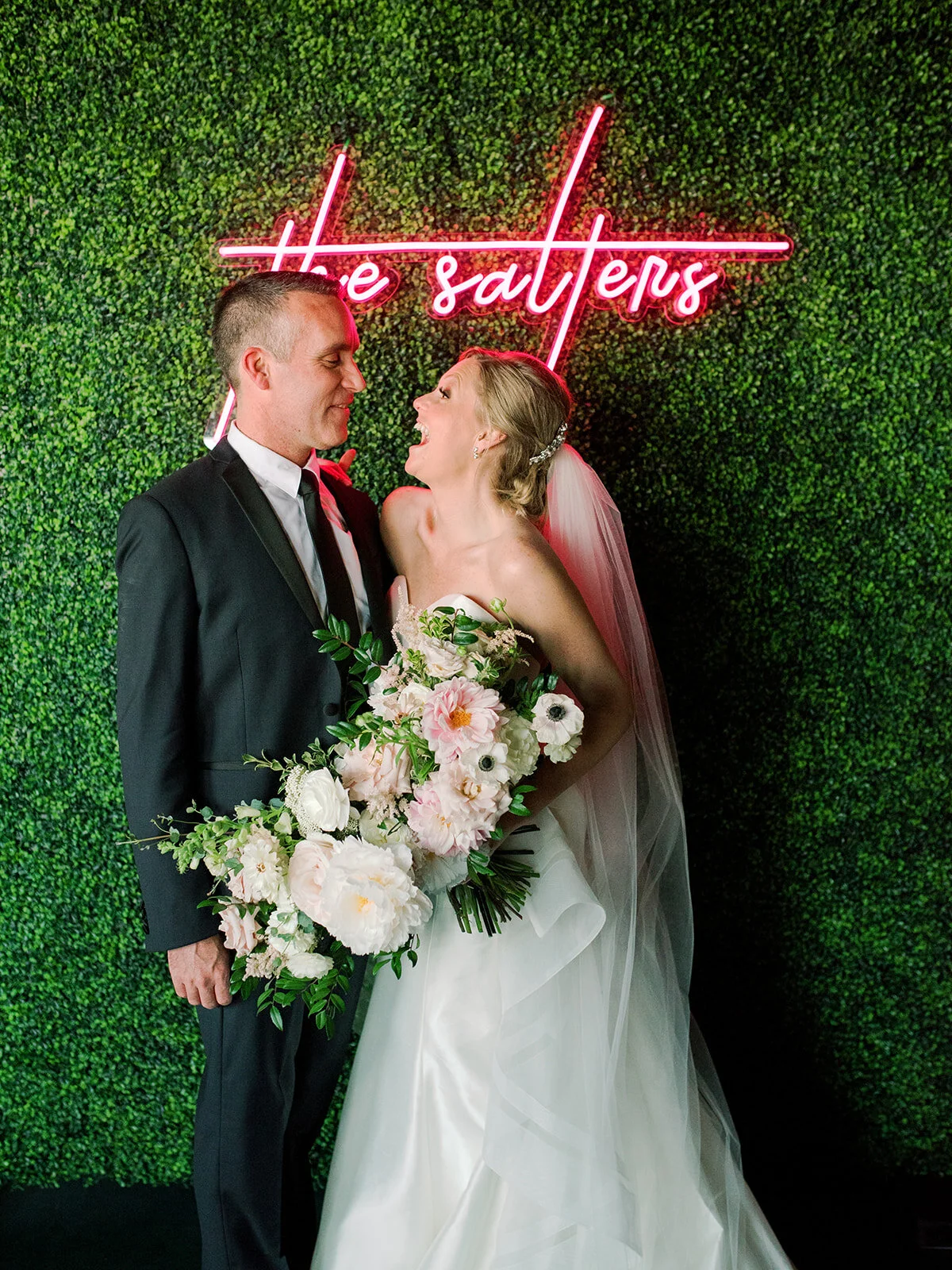 Downtown Nashville bride and groom portraits with blush and ivory color palette.