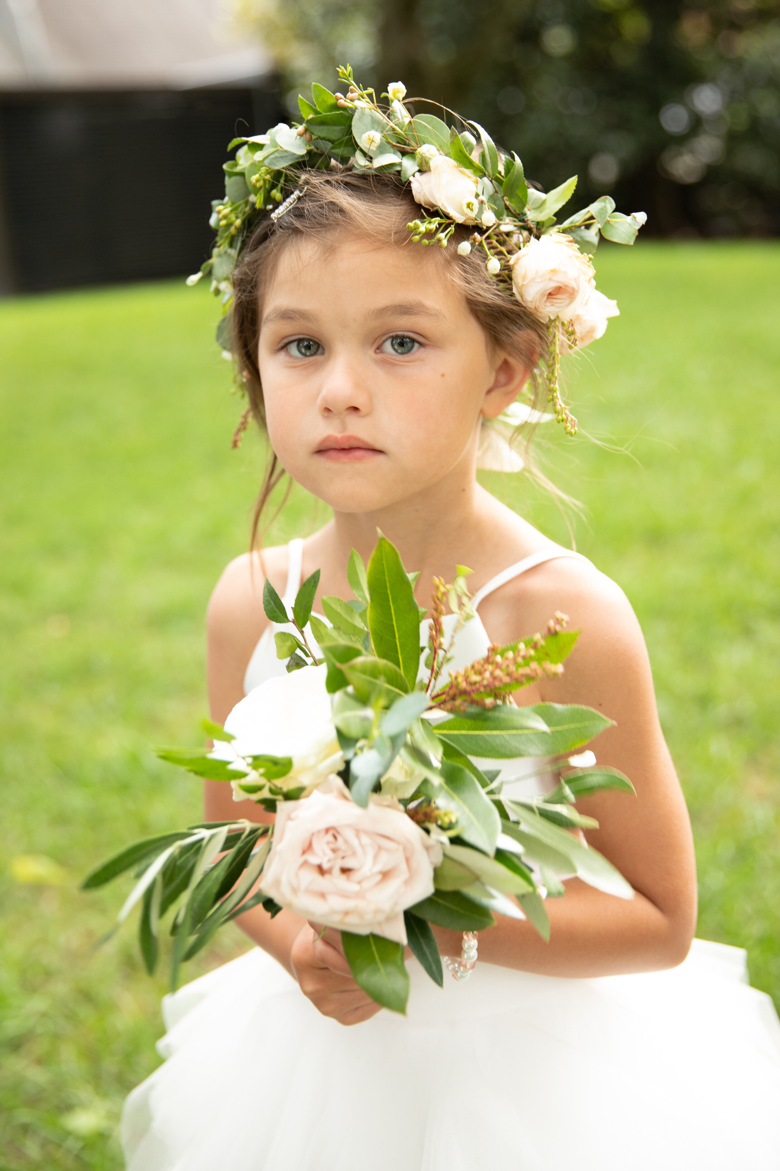 Dainty flower crown for the flower girl and a peony nosegay. Nashville wedding florist at Christ Church Cathedral.