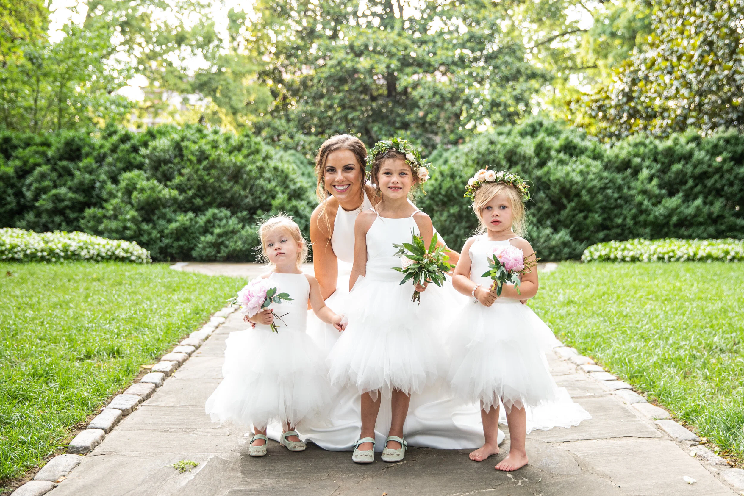 Dainty flower crown for the flower girl and a peony nosegay. Nashville wedding florist at Belle Meade Plantation.