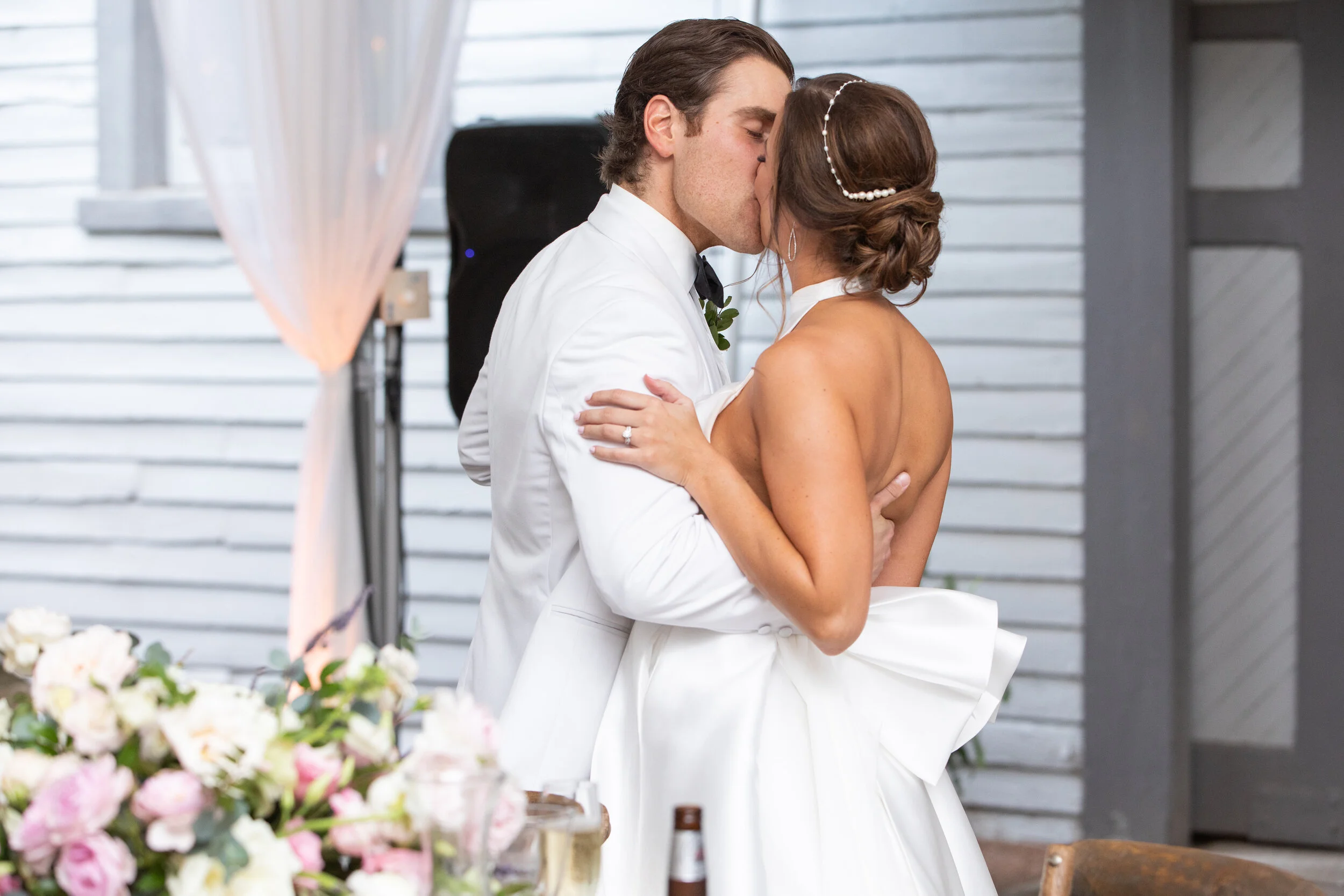 Low floral blush, ivory, and neutral centerpieces with hydrangeas, peonies, garden roses, ranunculus, ferns, and olives branches. Belle Meade Plantation wedding and event florist.