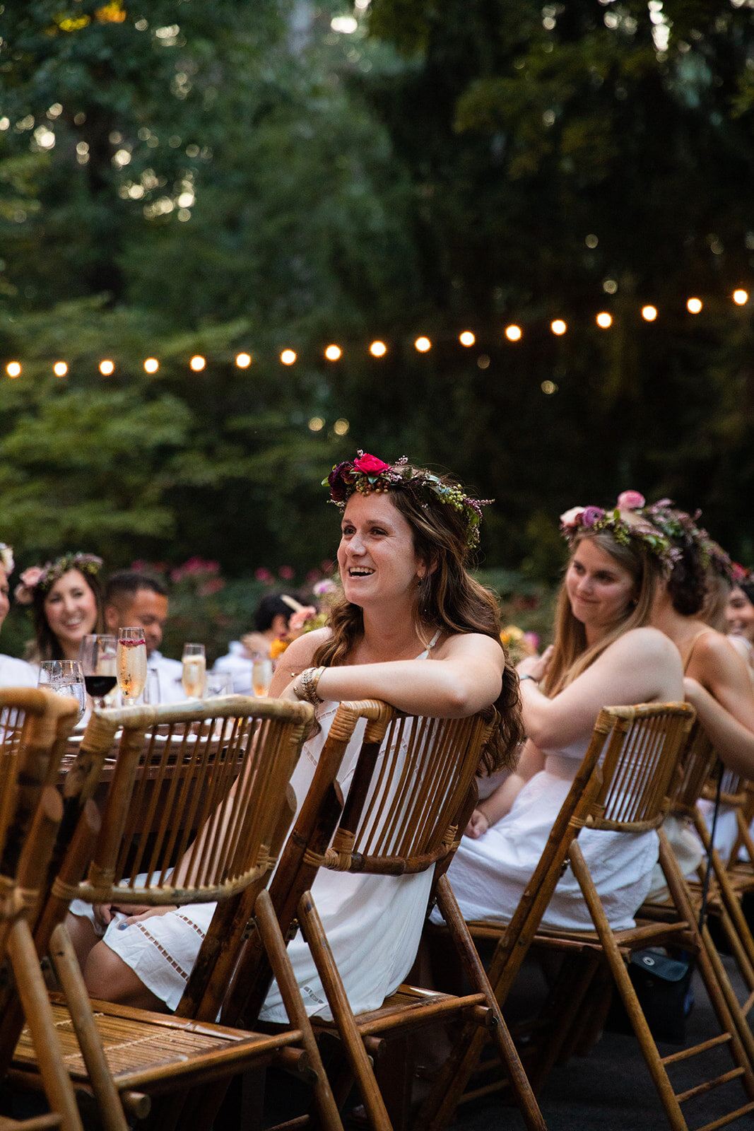 Welcome dinner on the front drive with wildflower centerpieces using ranunculus, chinos, hops, blackberries, persimmons, hops, garden roses, and natural, asymmetrical greenery. RT Lodge and Nashville wedding florist.