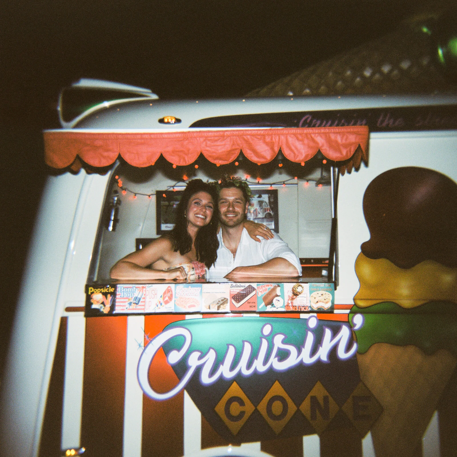 Welcome dinner on the front drive with wildflower centerpieces using ranunculus, chinos, hops, blackberries, persimmons, hops, garden roses, and natural, asymmetrical greenery. RT Lodge and Nashville wedding florist. Ice cream truck surprise for the…