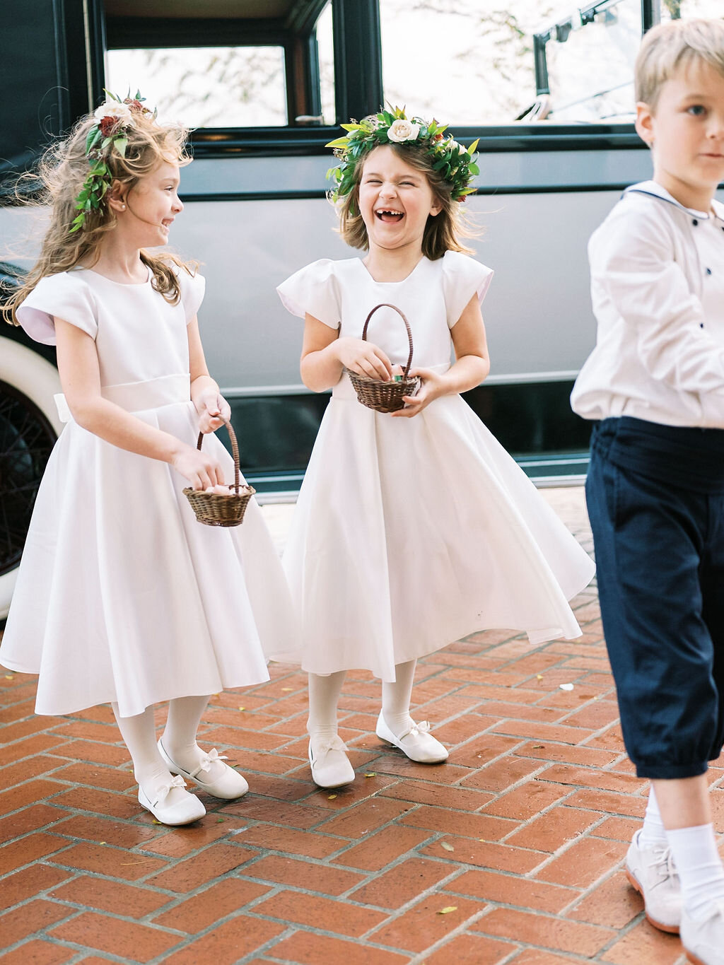 Dainty flower girl crowns with muted fall color palette and dusty blush rose petals. Vintage car for the bride. Nashville wedding floral designer, Mary Love Richardson of Rosemary & Finch.
