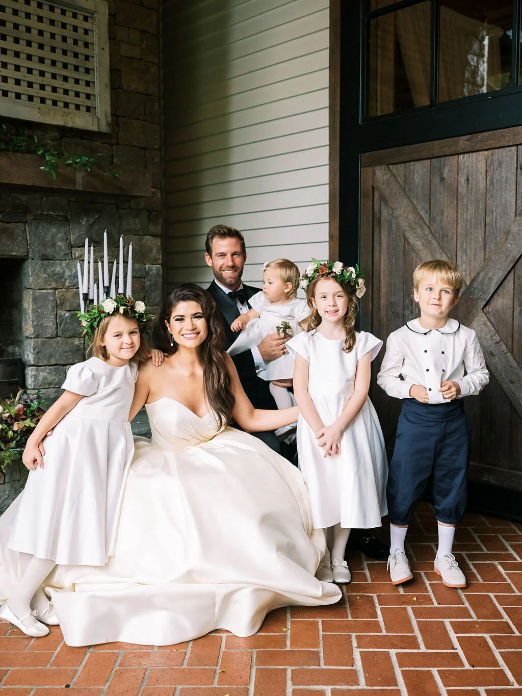 Lush, asymmetrical floral installation for the mantle. Wedding and event floral design at Trinity View Farm by Rosemary & Finch.