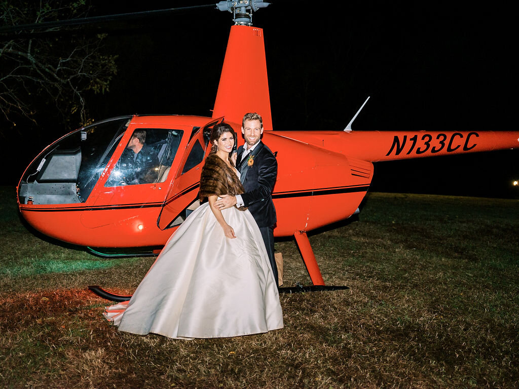 Helicopter getaway for the bride and groom. Nashville wedding and event floral design at Trinity View Farm.
