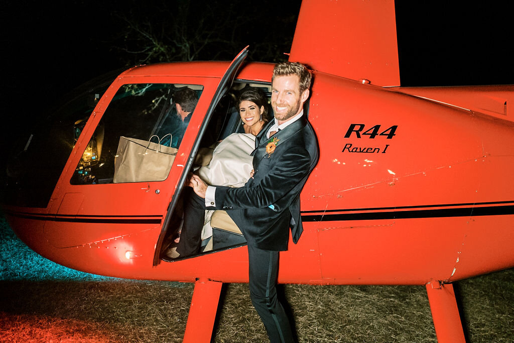 Helicopter getaway for the bride and groom. Nashville wedding and event floral design at Trinity View Farm.