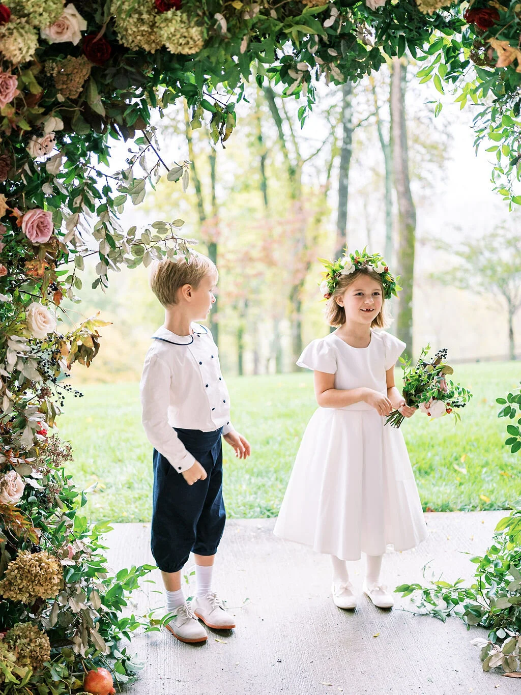 Dainty flower girl crowns with muted fall color palette and dusty blush rose petals. Vintage car for the bride. Nashville wedding floral designer, Mary Love Richardson of Rosemary & Finch.