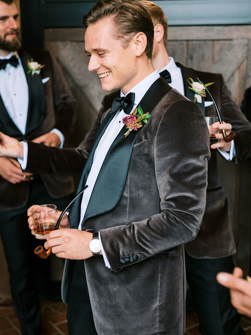 Unique fall boutonnieres with ranunculus, berries, autumn textures, and fall foliage. Nashville wedding florist at Trinity View Farm.