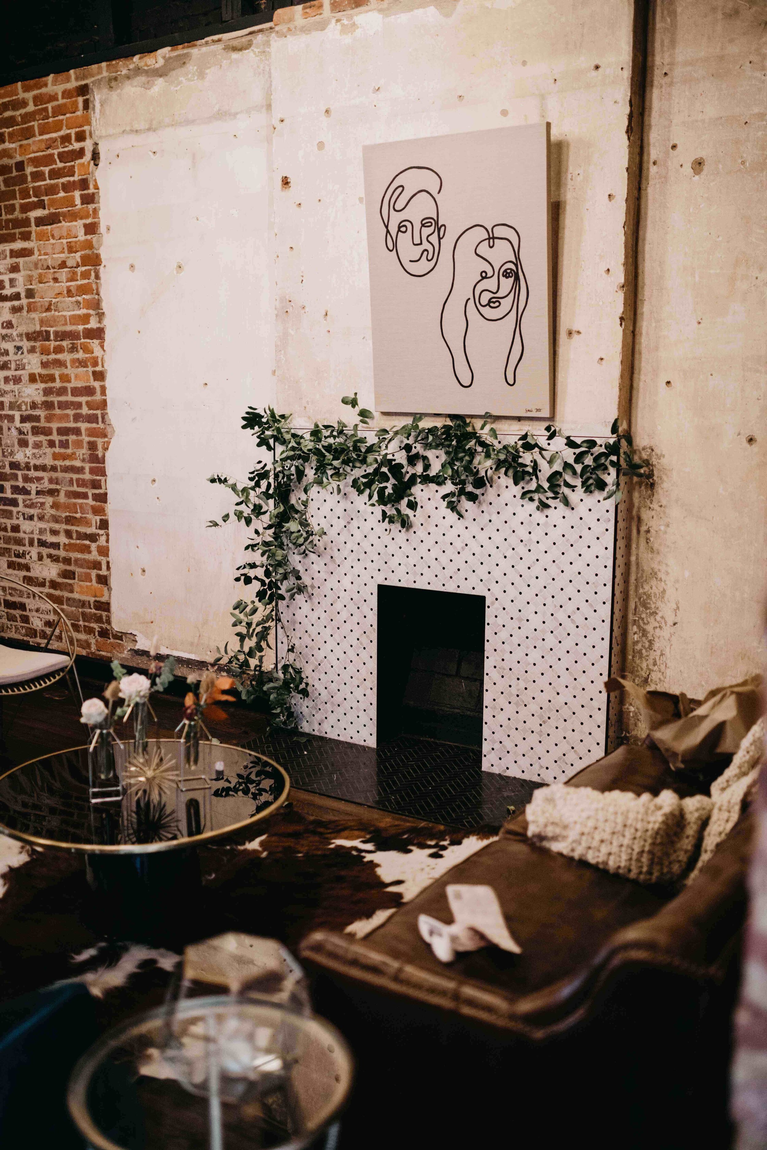 Trailing vines to accent the hearth at Clementine. Nashville wedding florist, Rosemary & Finch.