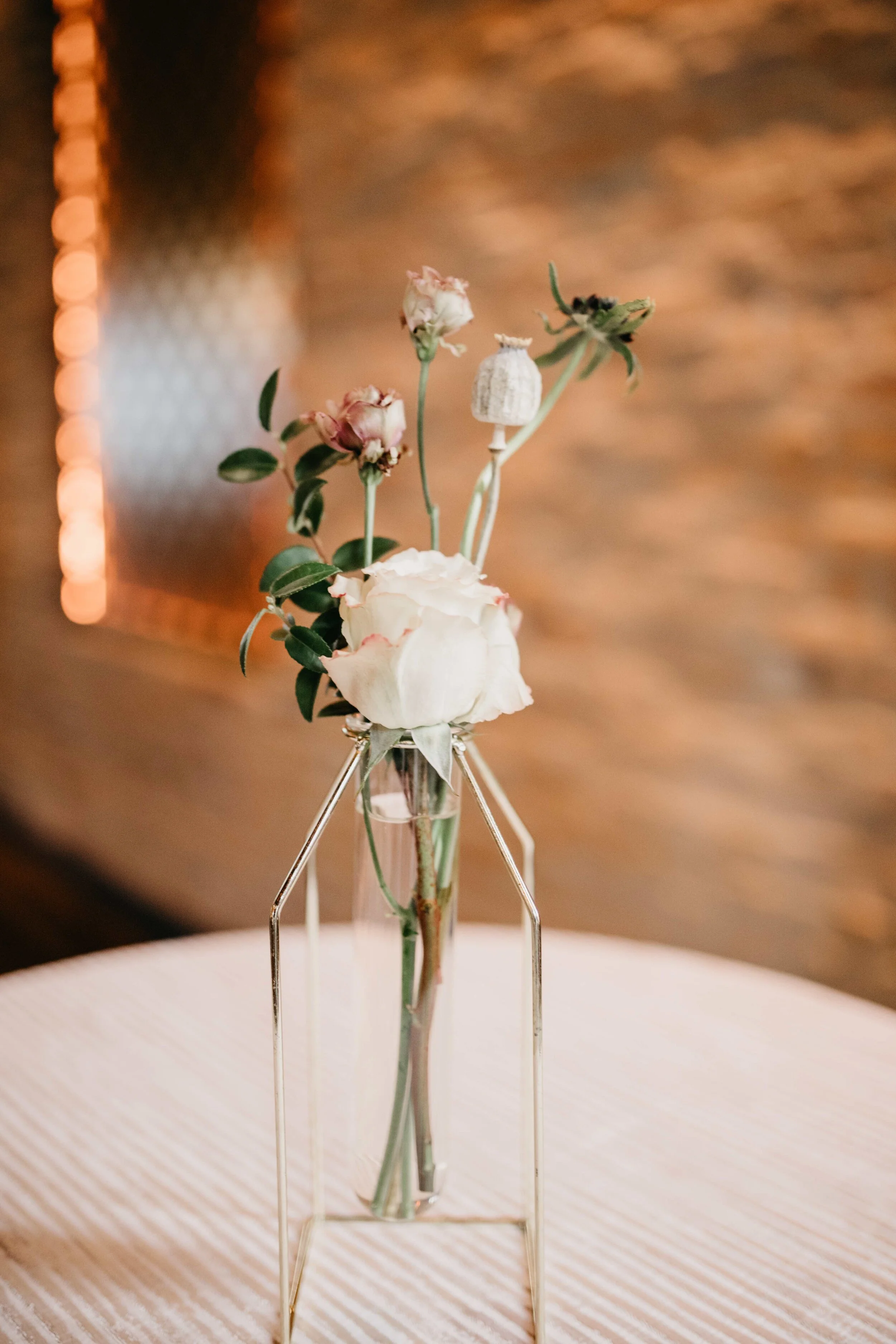 Modern, geometric bud vase with fall florals and dried elements. Nashville wedding florist, Rosemary & Finch, at Clementine.