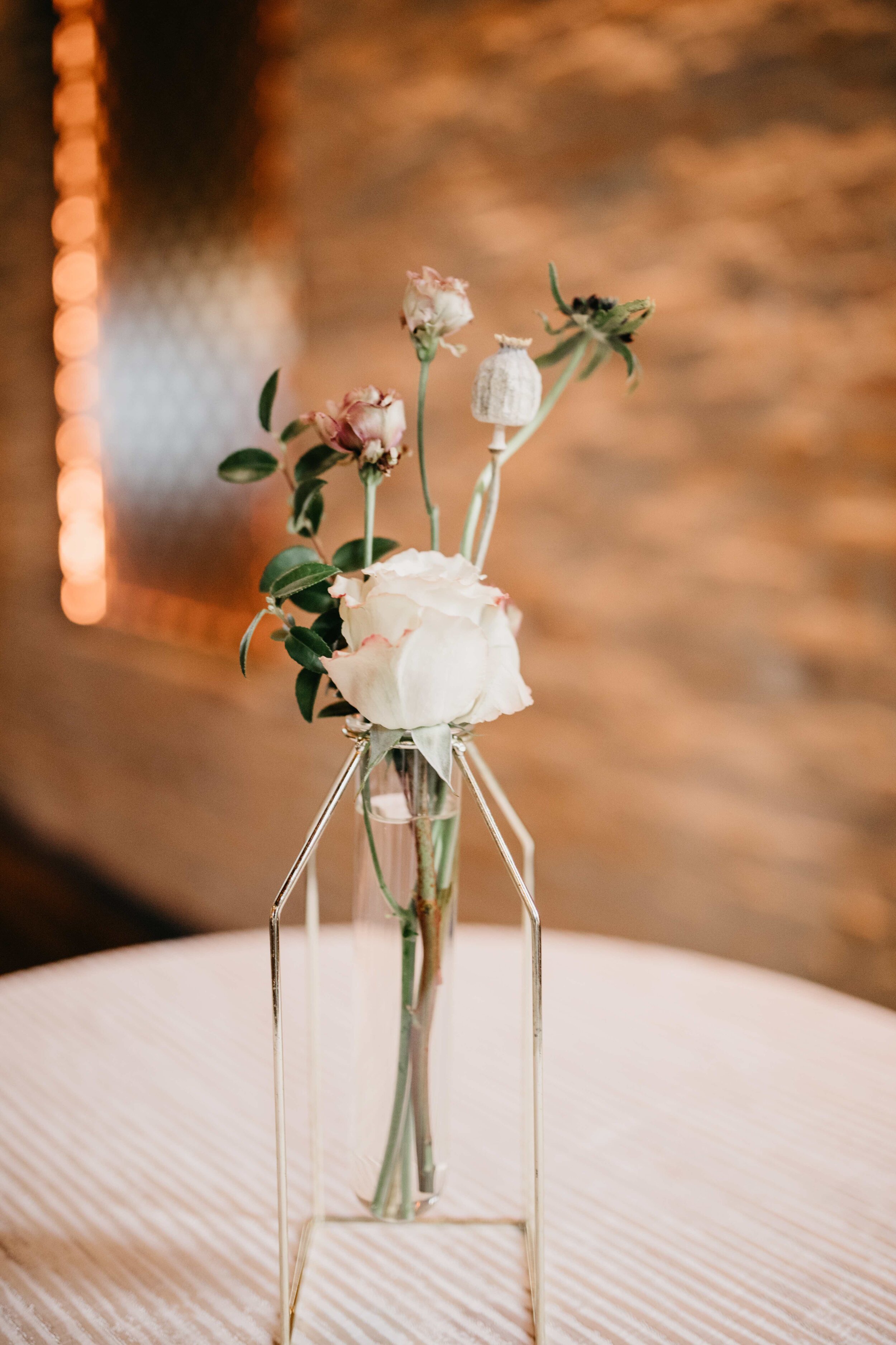 Modern, geometric bud vase with fall florals and dried elements. Nashville wedding florist, Rosemary & Finch, at Clementine.