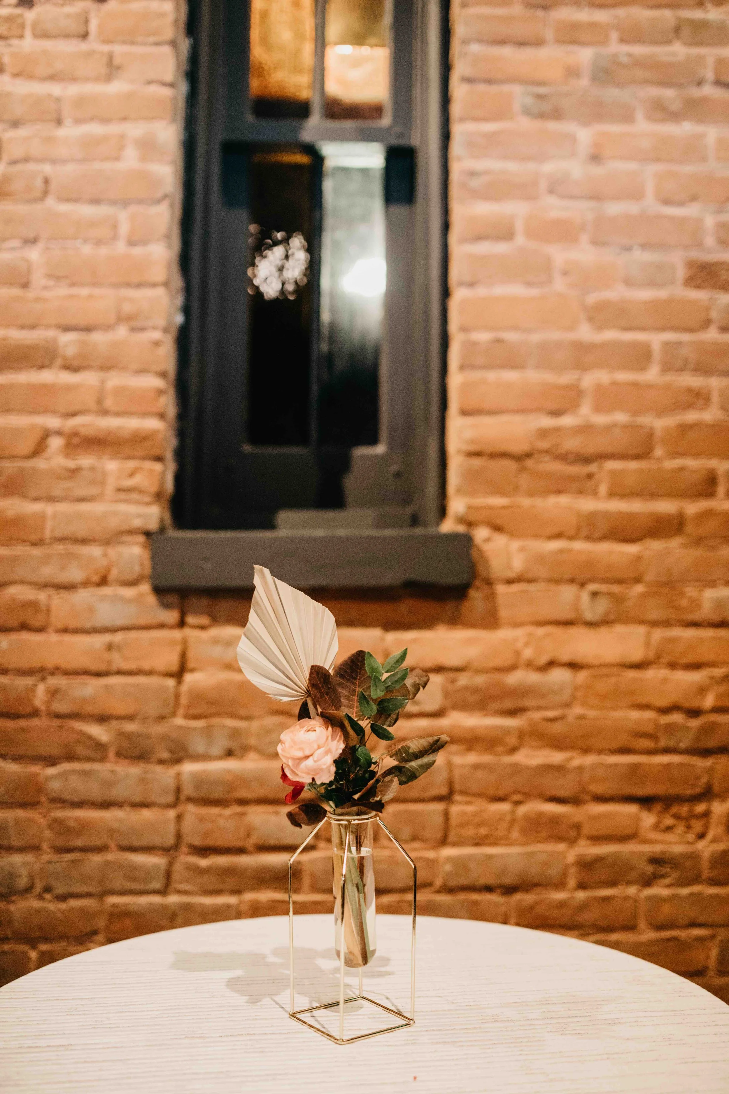 Modern, geometric bud vase with fall florals and dried elements. Nashville wedding florist, Rosemary & Finch, at Clementine.