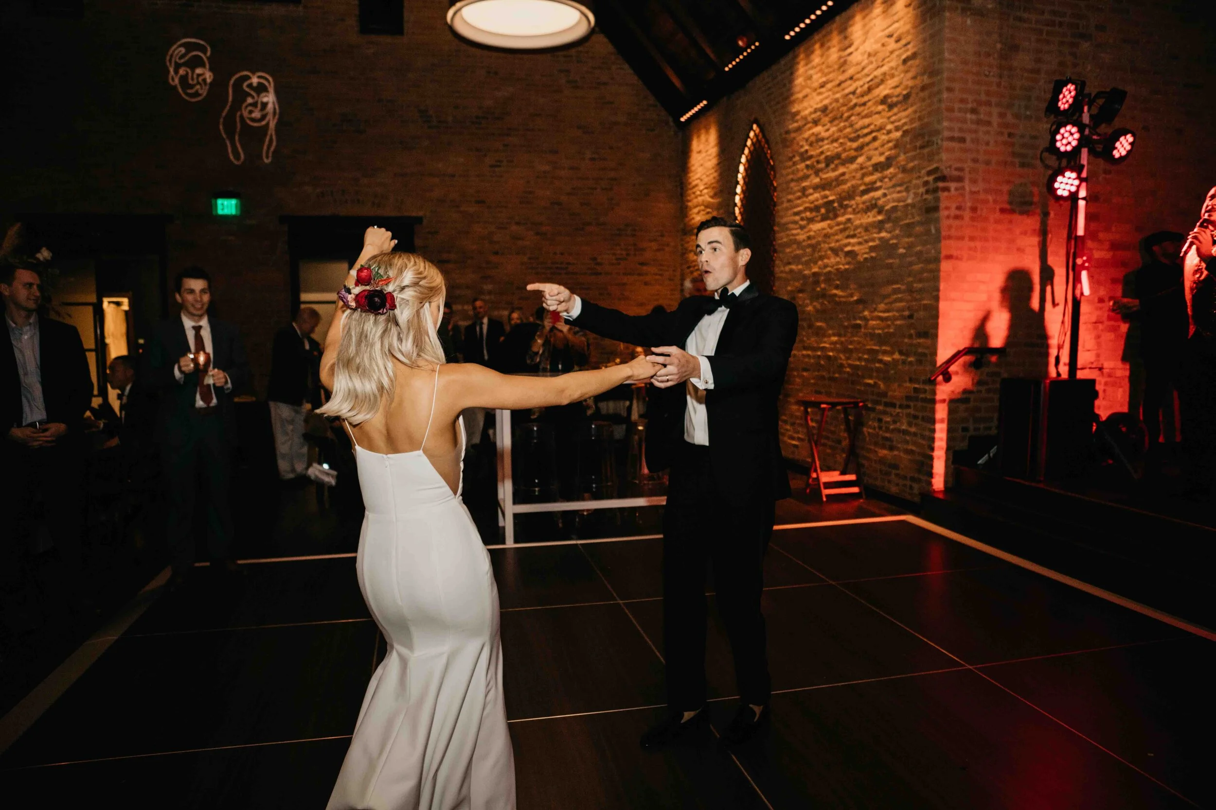 Lush, asymmetrical bridal bouquet with rich fall color palette of deep plum, eggplant, copper, and rusty orange with garden roses, ranunculus, and greenery. Nashville wedding floral designer, Rosemary & Finch, at Clementine.