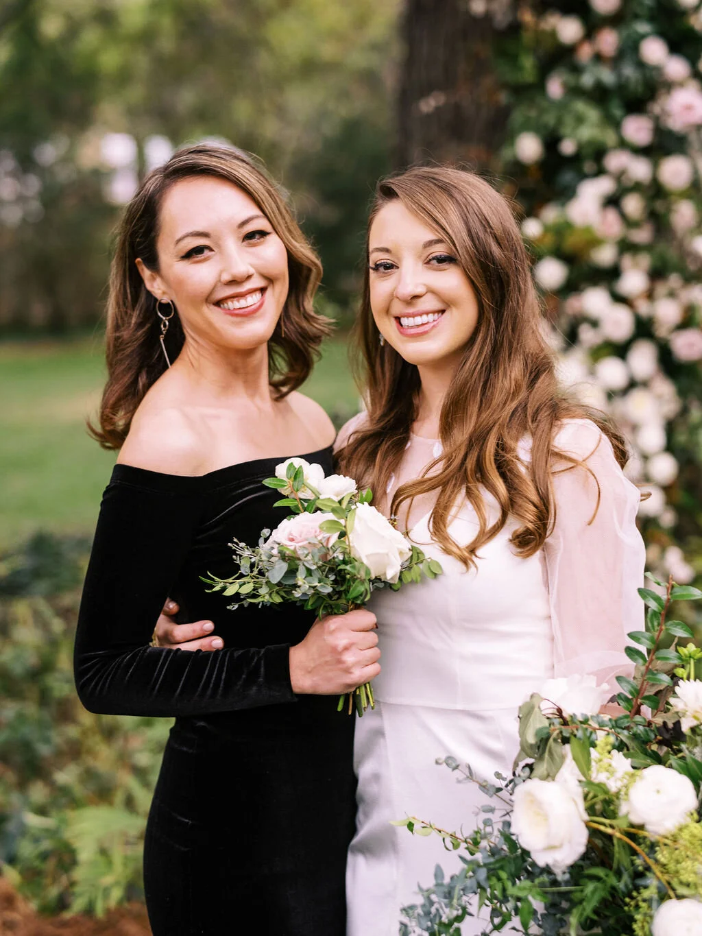 Elegant bridal party in all black with white florals and organic greenery. Belle Meade garden wedding with Nashville florist, Rosemary & Finch.