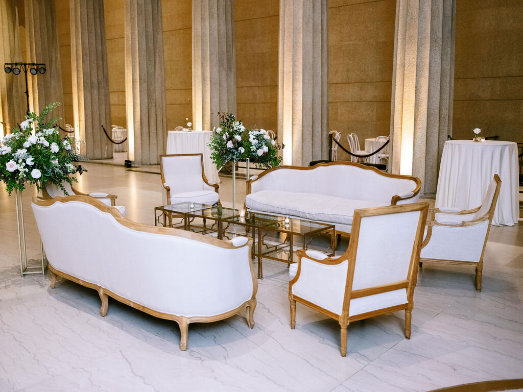 Garden inspired floral centerpieces for a wedding reception at the Parthenon in Nashville.
