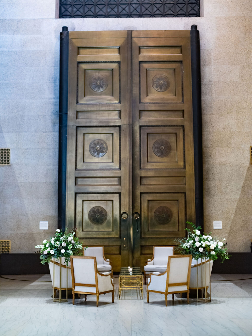 Garden inspired floral centerpieces for a wedding reception at the Parthenon in Nashville.