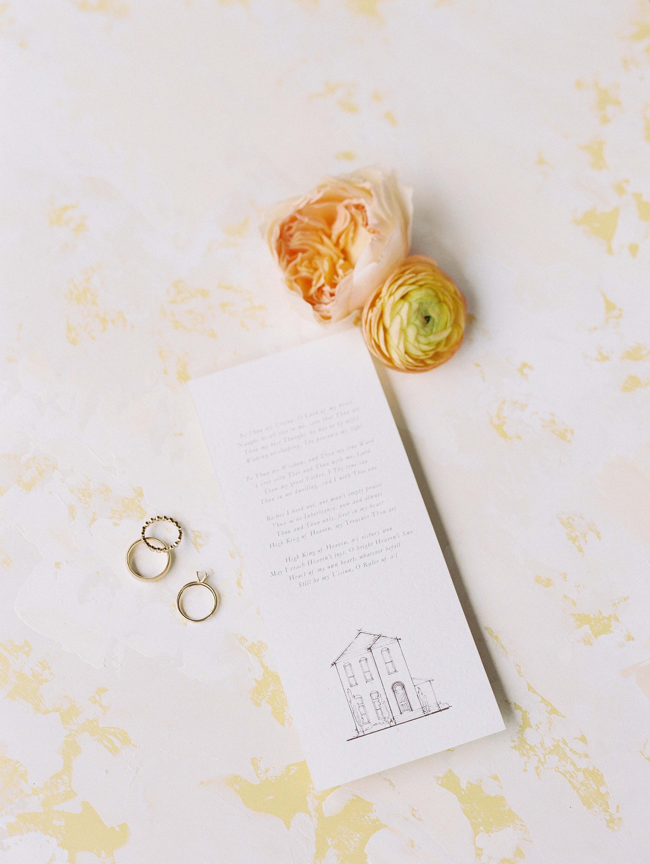 Vine-like greenery installation - creating an arch on the white wall at the Cordelle as the wedding ceremony backdrop. Nashville wedding floral design.