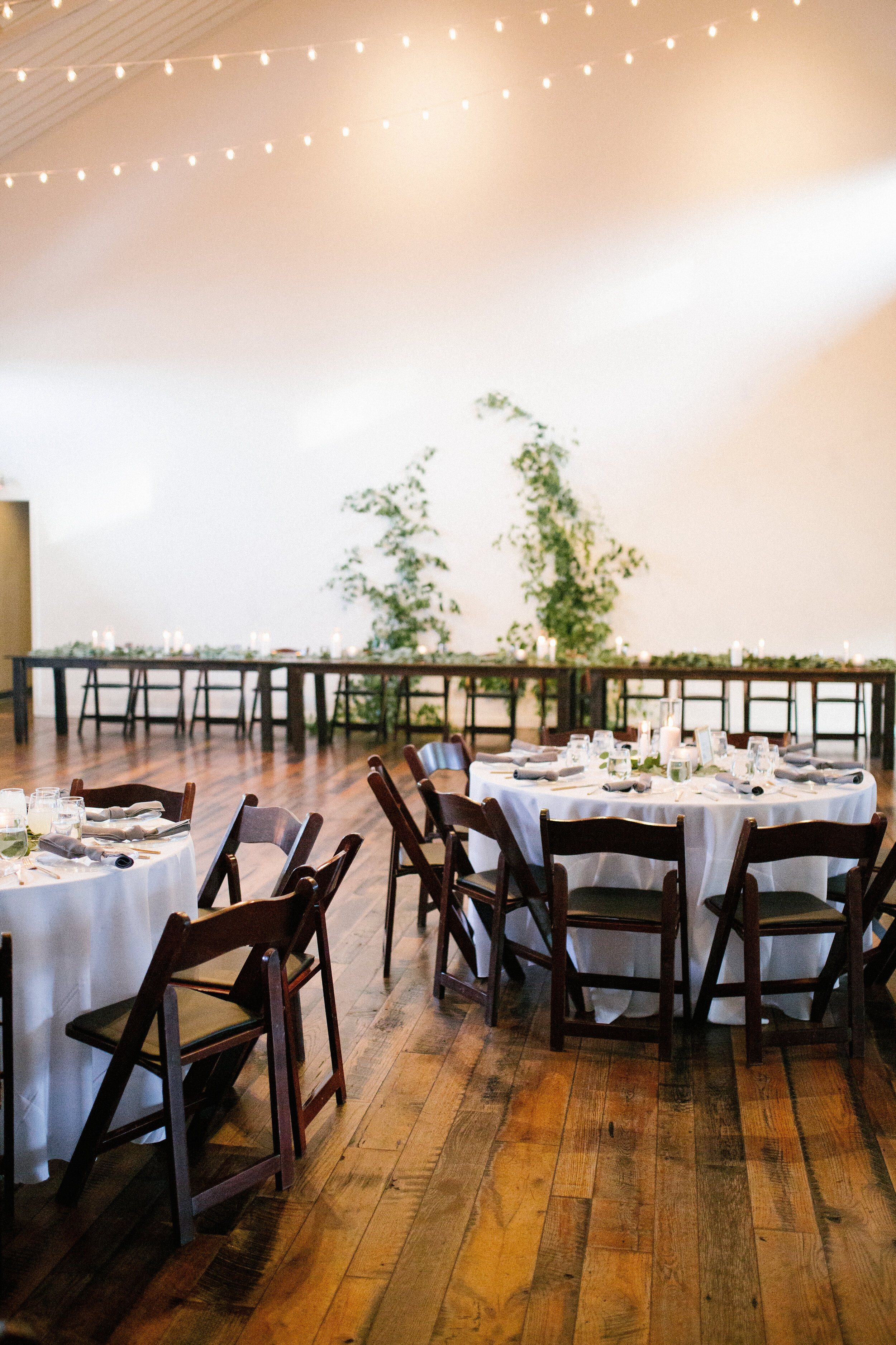 Light eucalyptus table garlands at the Cordelle. Nashville wedding flowers.