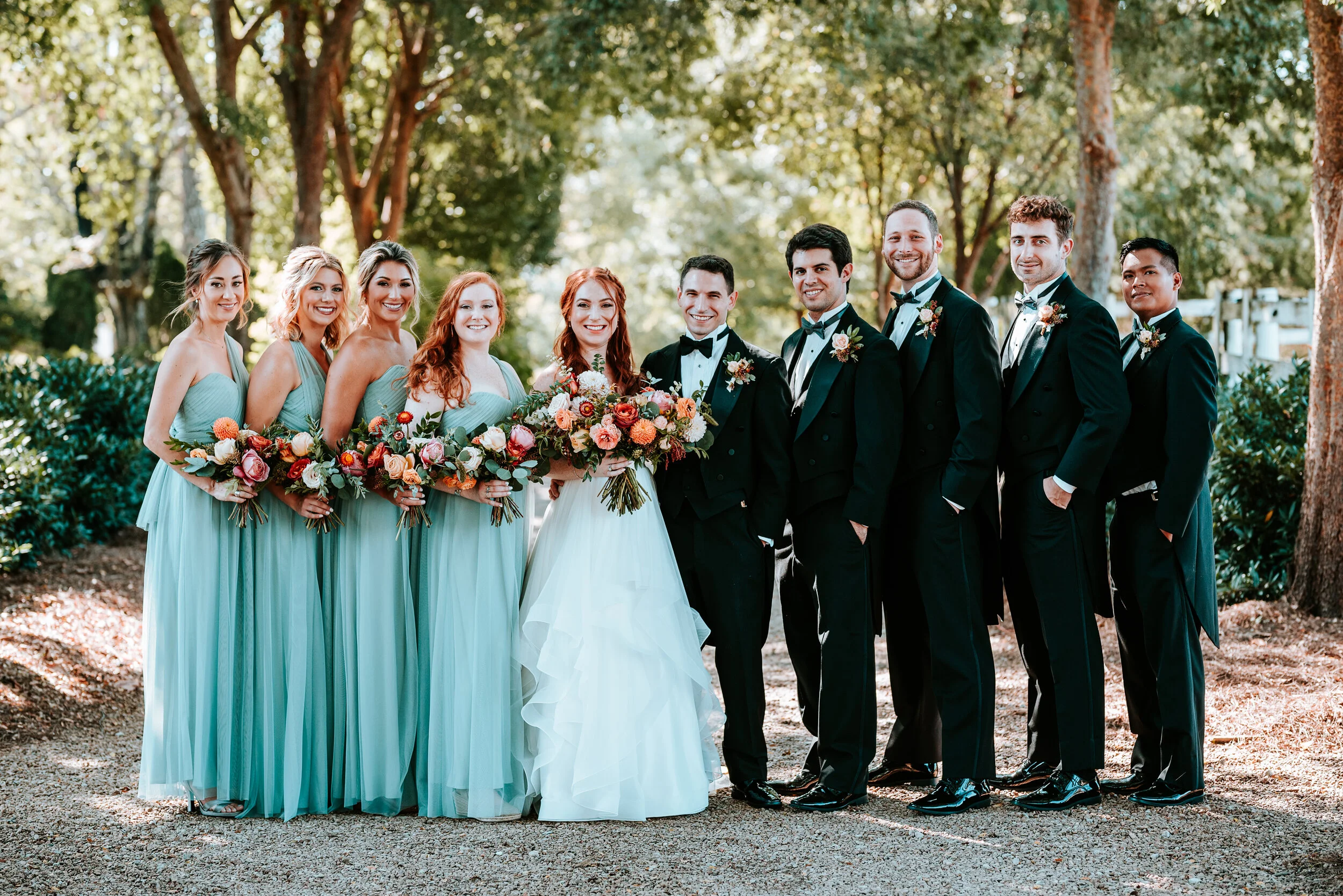 October wedding at Long Hollow Gardens with lush, asymmetrical flower arrangements in a rusty orange and soft peach color palette. Nashville wedding floral design.
