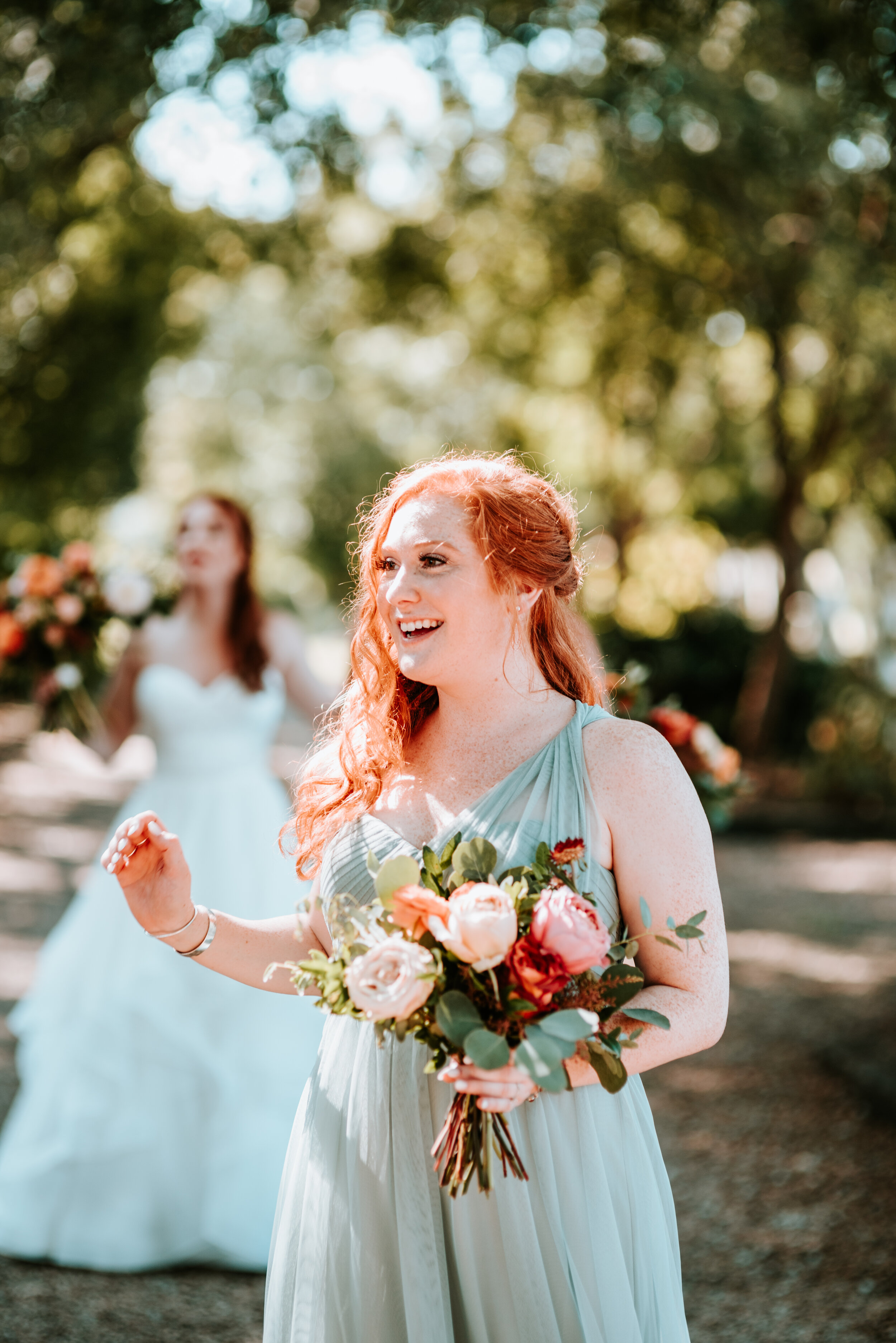 October wedding at Long Hollow Gardens with lush, asymmetrical flower arrangements in a rusty orange and soft peach color palette. Nashville wedding floral design.