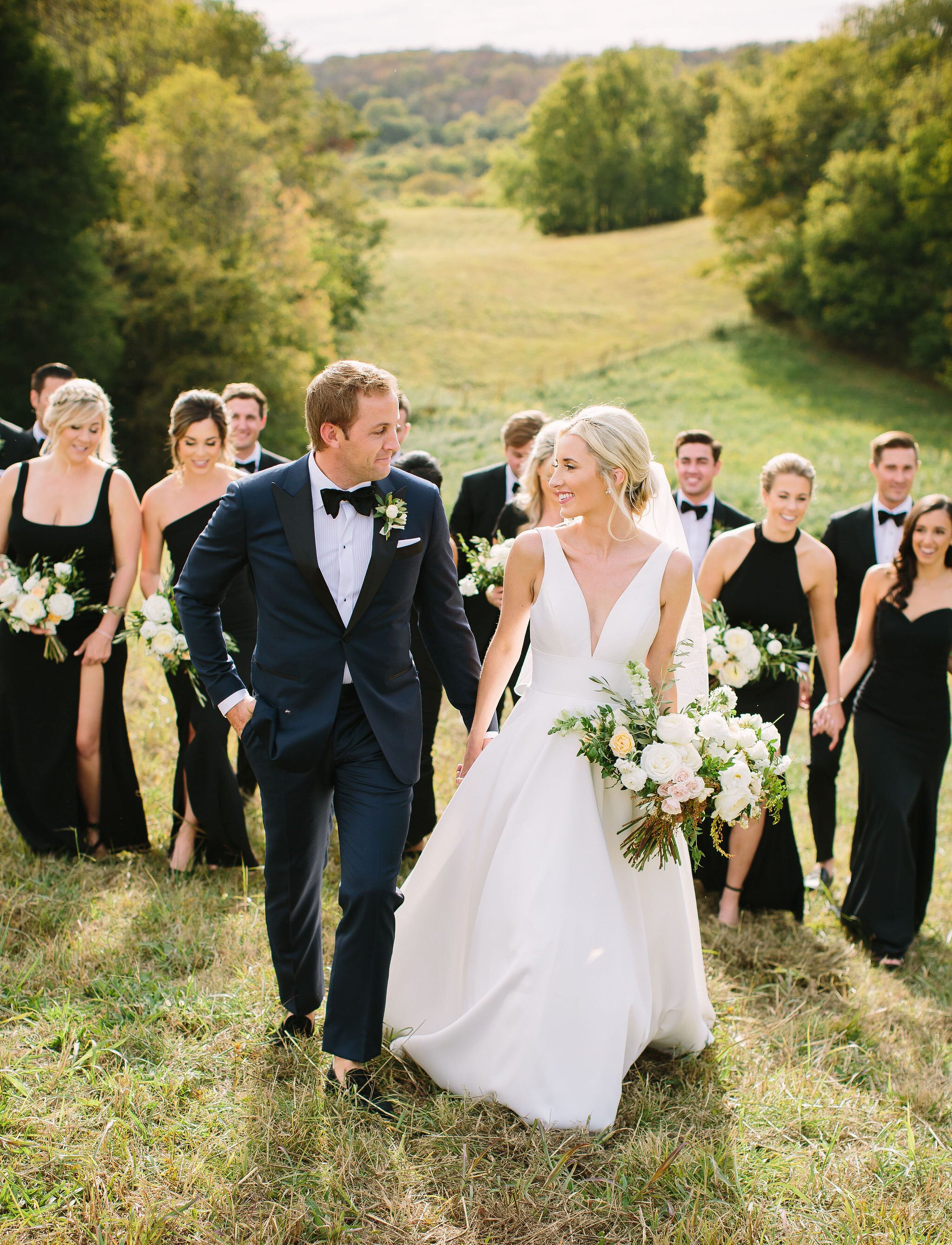 Tennessee countryside October wedding at Bloomsberry Farm with all white and greenery floral design. Nashville wedding florist.