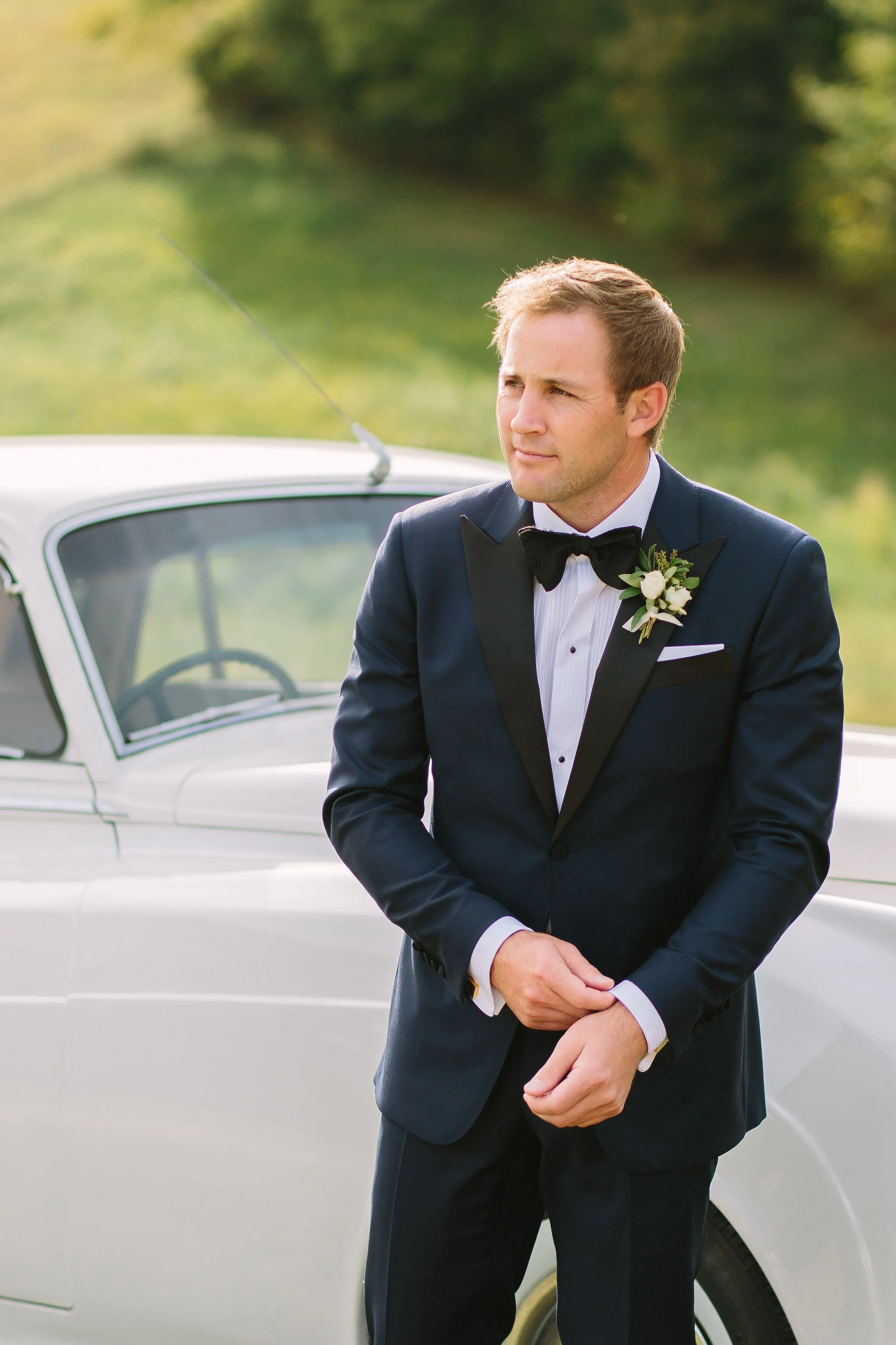 Tennessee countryside October wedding at Bloomsbury Farm with all white and greenery floral design. Nashville wedding florist.