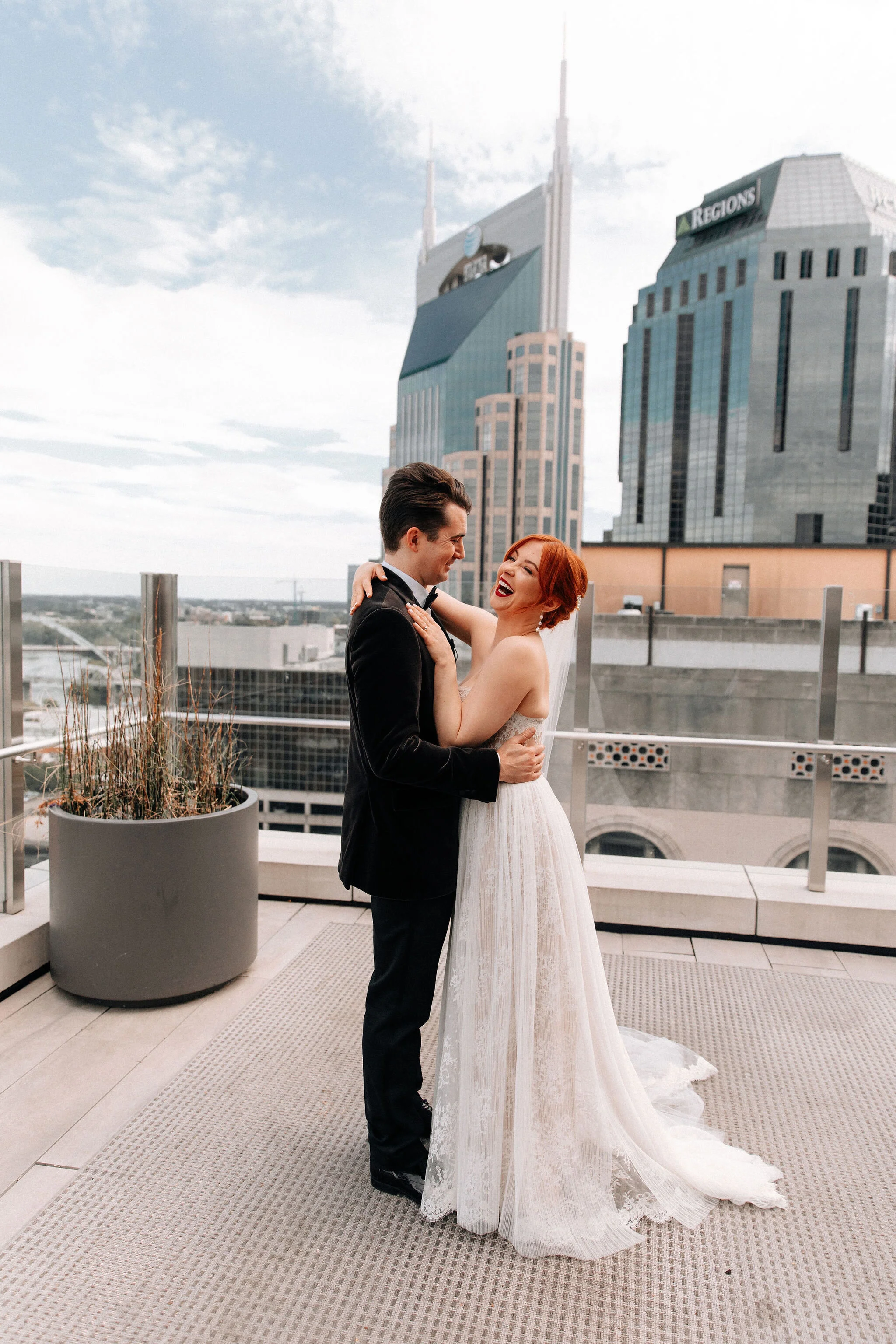 Fall wedding in the ballroom of the Noelle Boutique Hotel in downtown Nashville with lush, garden inspired floral design.
