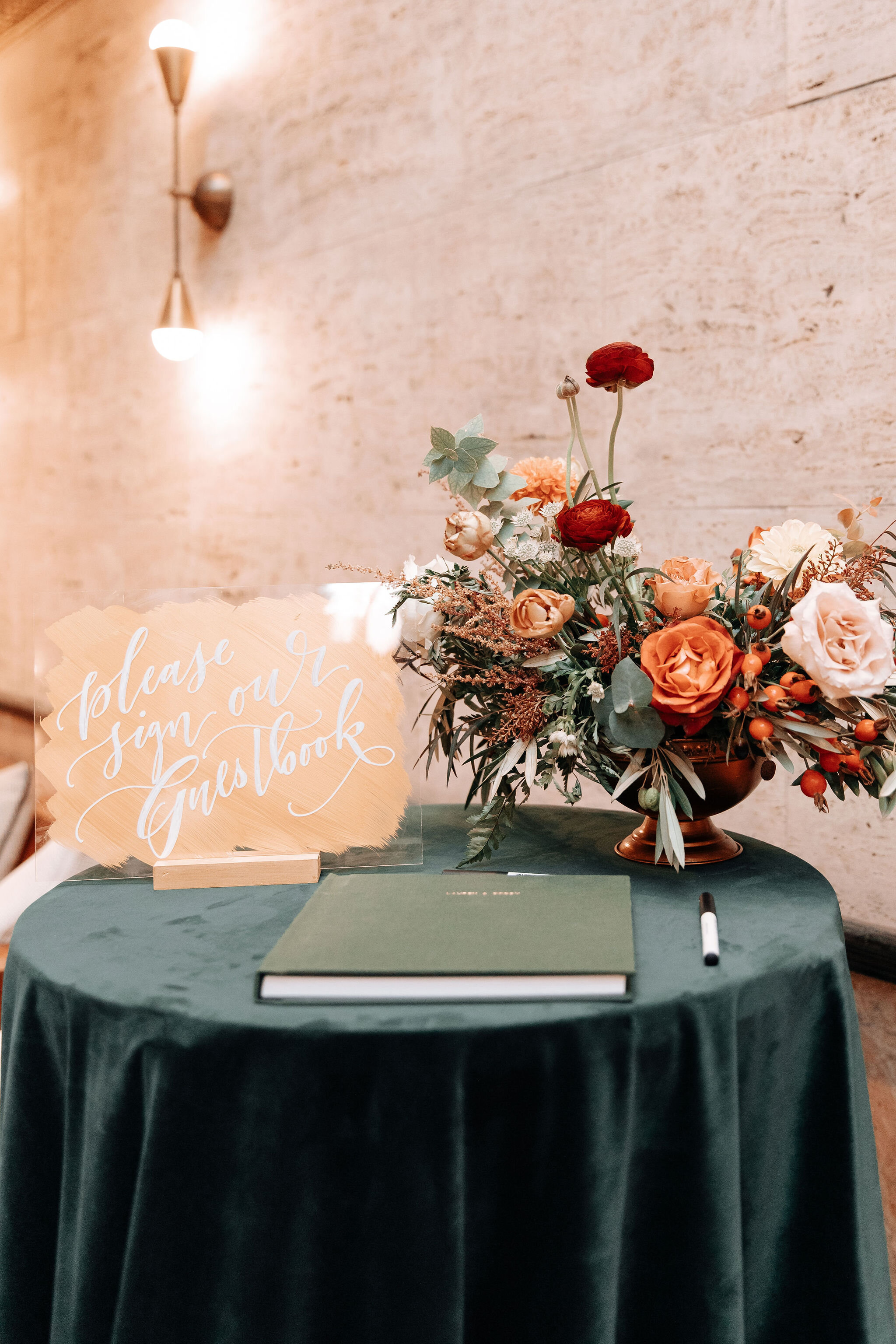 Fall wedding in the ballroom of the Noelle Boutique Hotel in downtown Nashville with lush, garden inspired floral design.