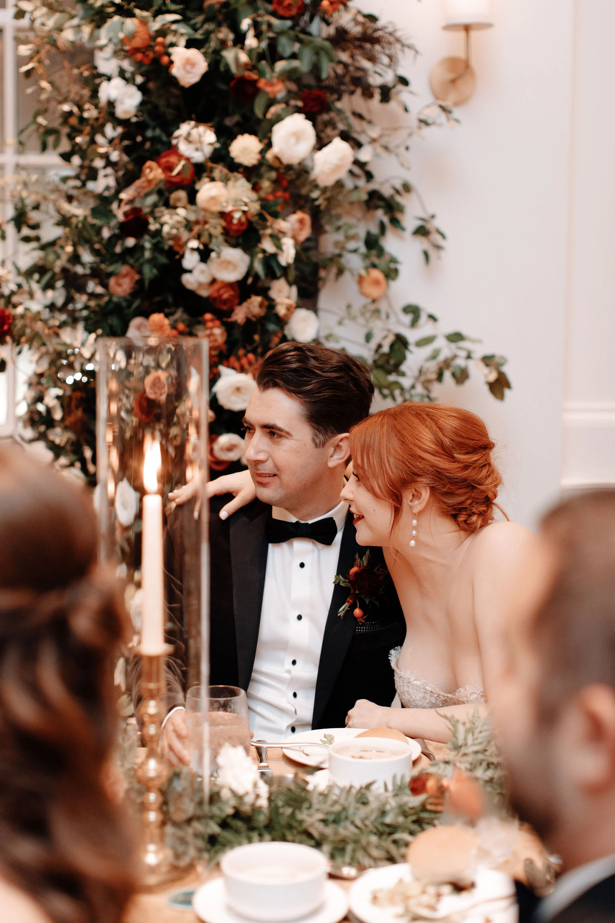 Fall wedding in the ballroom of the Noelle Boutique Hotel in downtown Nashville with lush, garden inspired floral design.