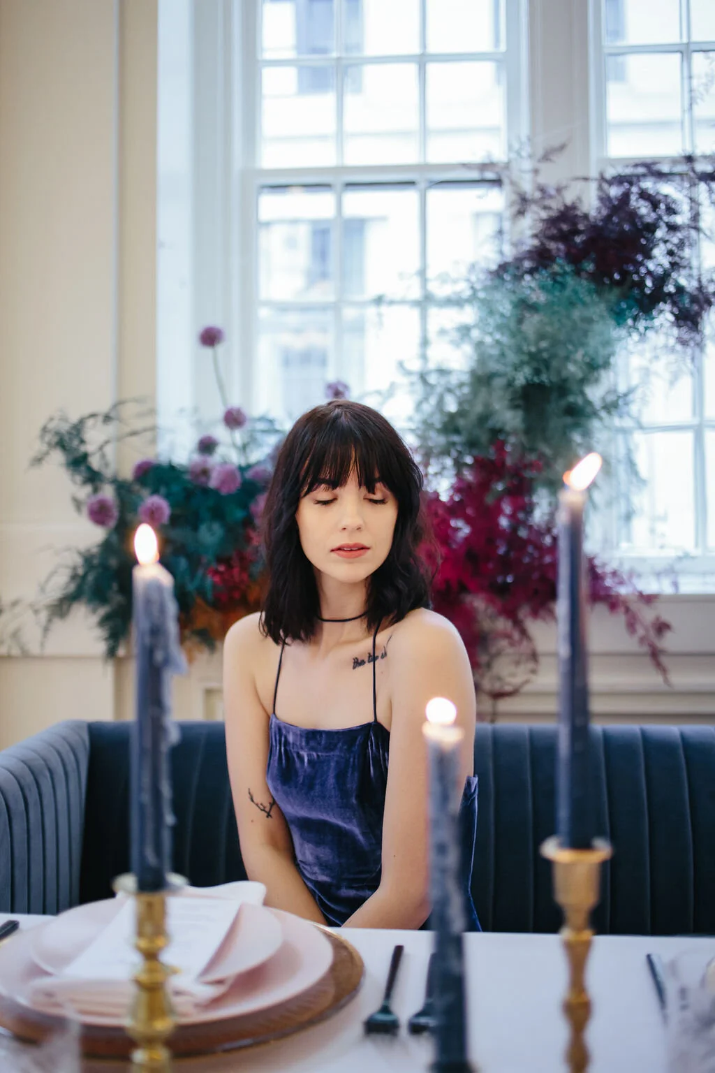 Rainbow colored floral installation with painted and dyed baby’s breath and plums ferns. Modern, minimal, colorful wedding flowers at the Noelle Hotel in downtown Nashville.