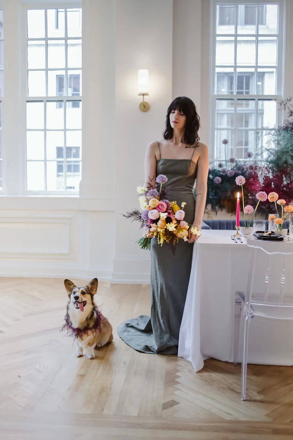 Rainbow colored floral installation with painted and dyed baby’s breath and plums ferns. Modern, minimal, colorful wedding flowers at the Noelle Hotel in downtown Nashville.