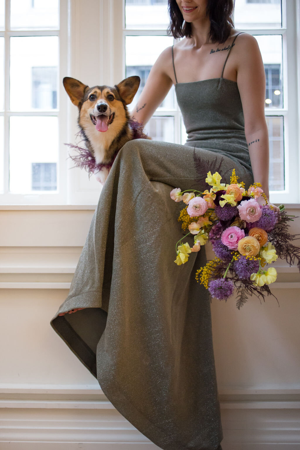 Modern, colorful bridal bouquet with yellow sweet peas, purple allium, pink and peach ranunculus, golden acacia, and painted eggplant plums fern. Nashville wedding florist. Printer’s Alley portraits.
