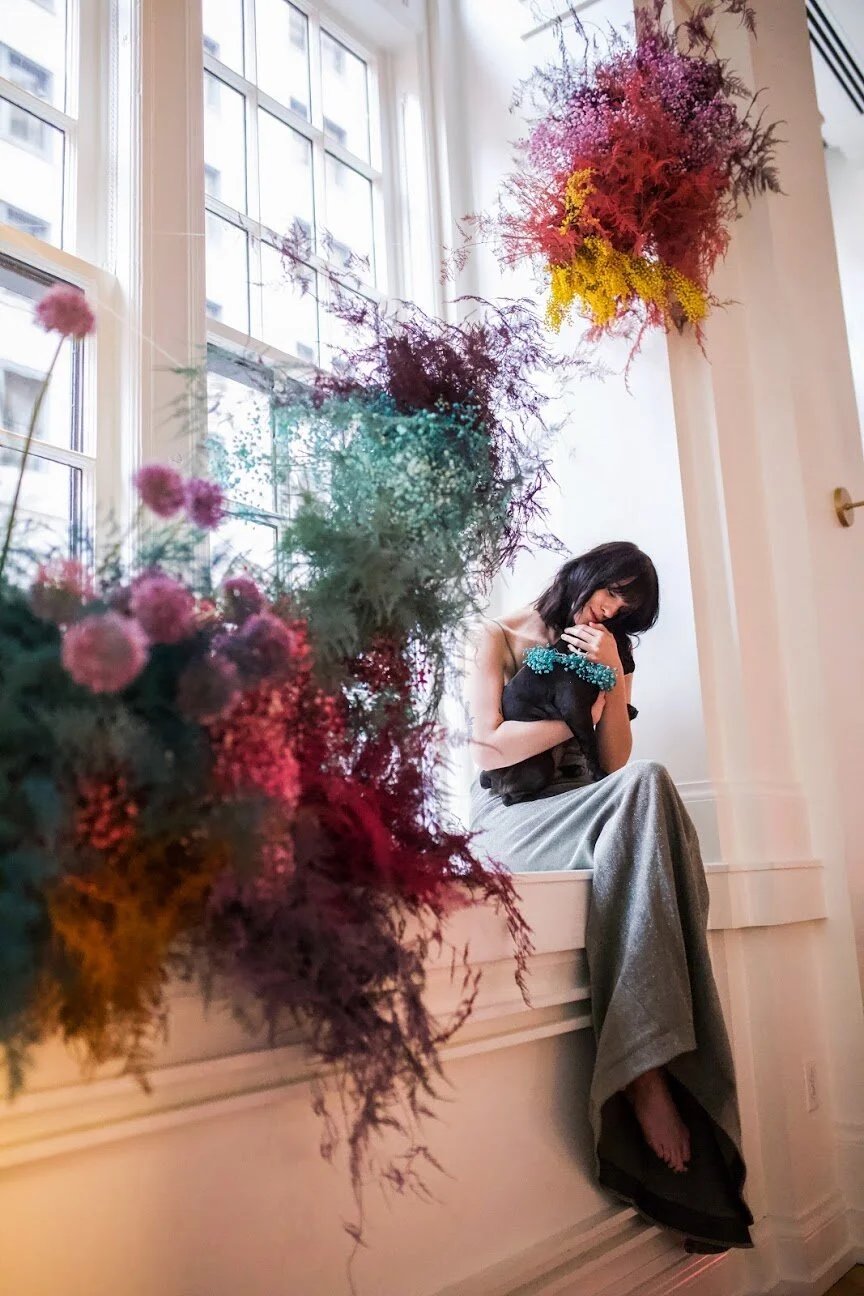 Rainbow colored floral installation with painted and dyed baby’s breath and plums ferns. Modern, minimal, colorful wedding flowers at the Noelle Hotel in downtown Nashville.