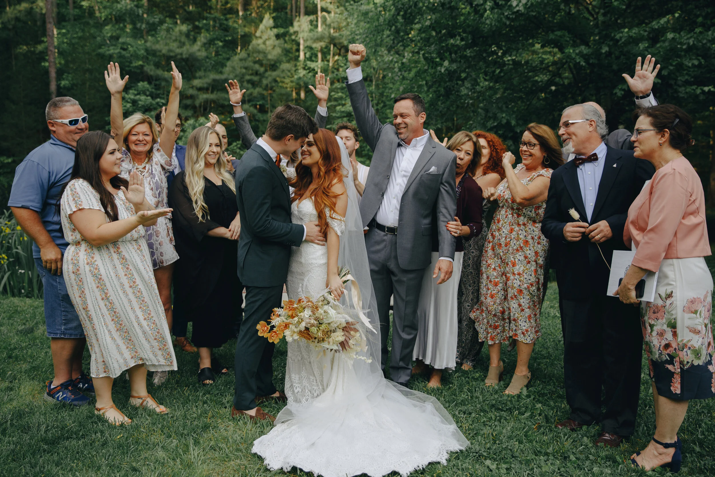 Lush, bohemian bridal bouquet with white garden roses, copper orchids, dried white ferns, earthy textures, and toffee lisianthus. Nashville wedding and elopement floral designer.