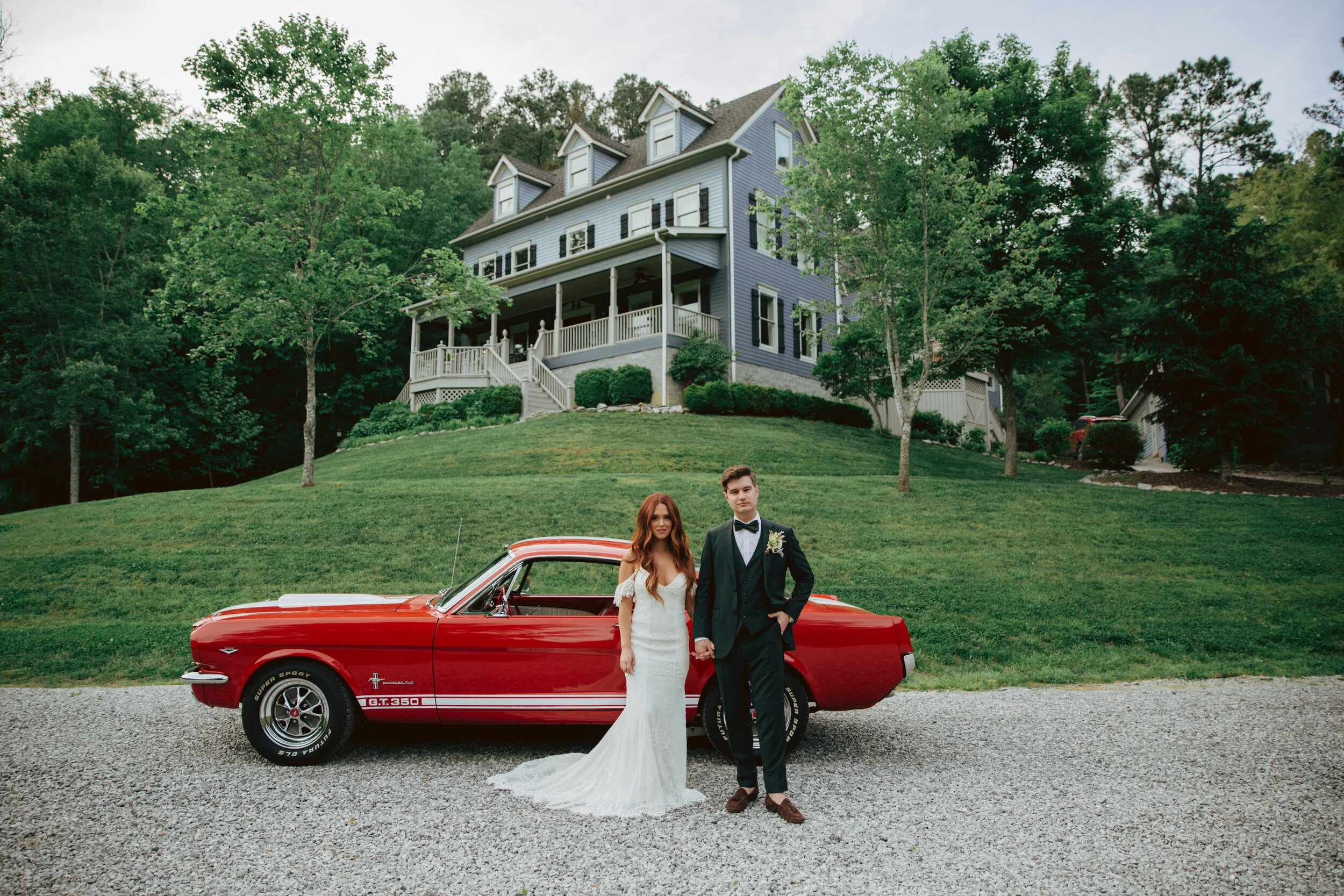 Lush, bohemian bridal bouquet with white garden roses, copper orchids, dried white ferns, earthy textures, and toffee lisianthus. Nashville wedding and elopement floral designer.
