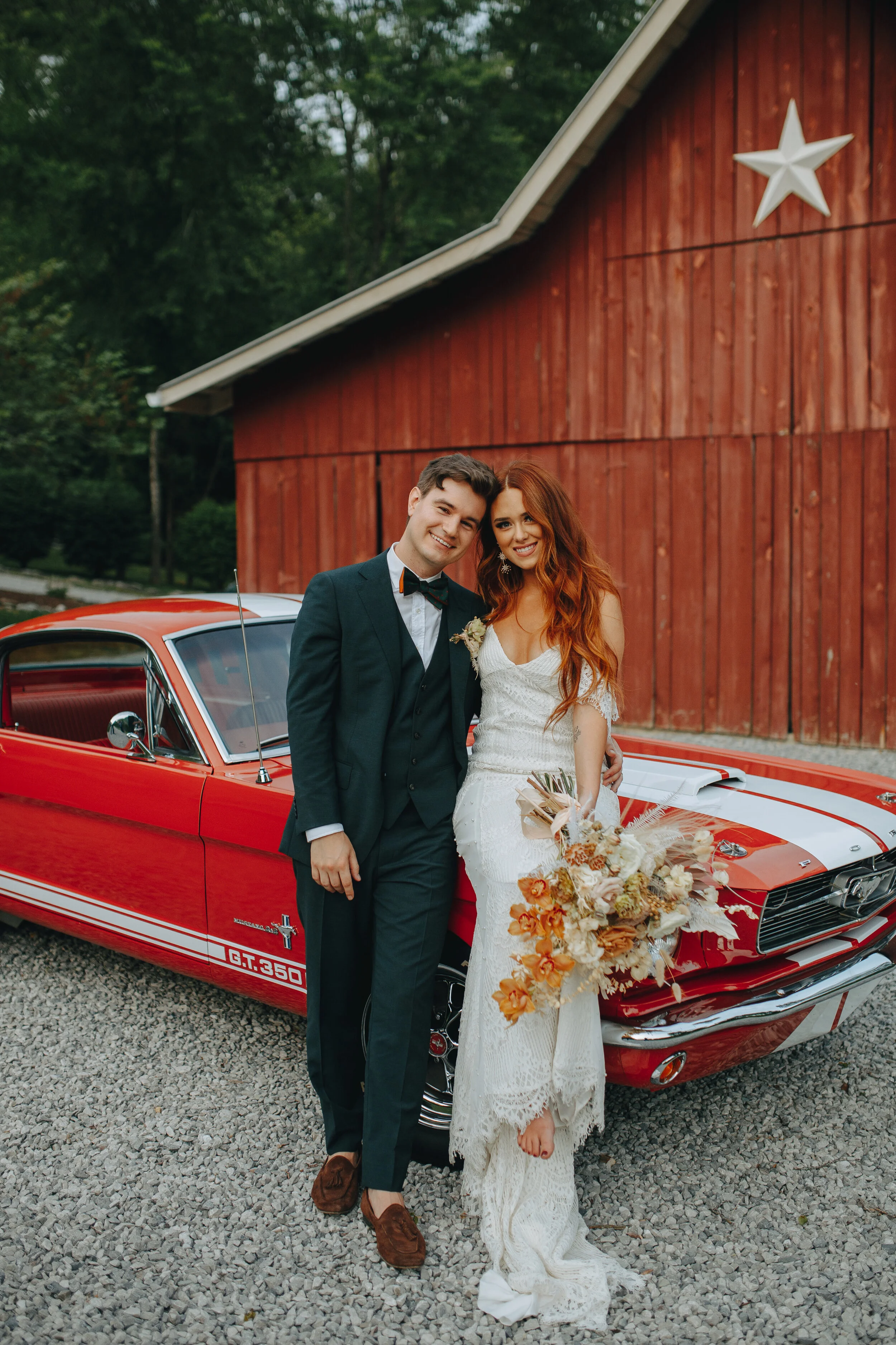Lush, bohemian bridal bouquet with white garden roses, copper orchids, dried white ferns, earthy textures, and toffee lisianthus. Nashville wedding and elopement floral designer.