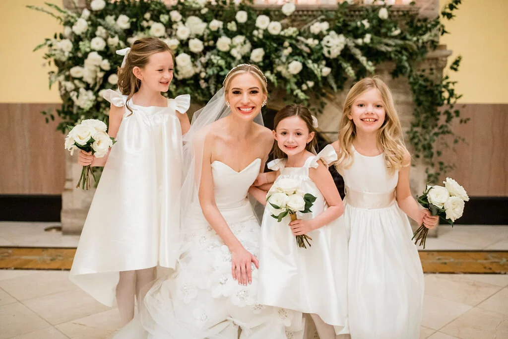 Lush fireplace mantle floral installation with all white garden roses, hydrangeas, and ranunculus with natural, untamed greenery and eucalyptus. Nashville floral designer, Rosemary & Finch, for a wedding at Union Station.