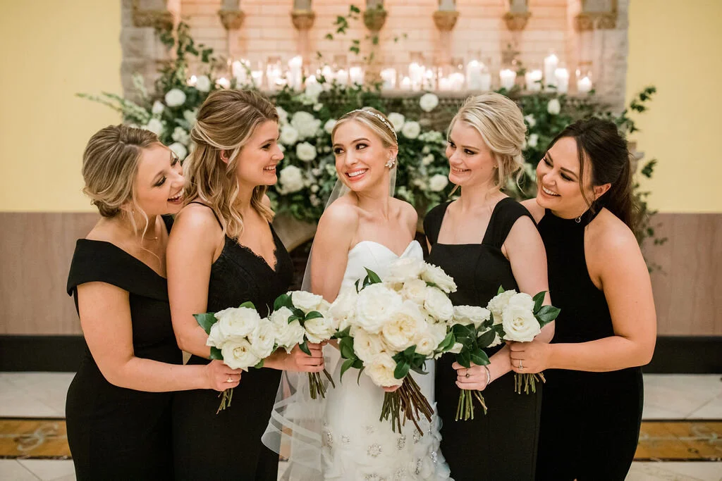 Bridal bouquet of all white garden roses and dark greenery. Nashville wedding flowers by Rosemary & Finch.