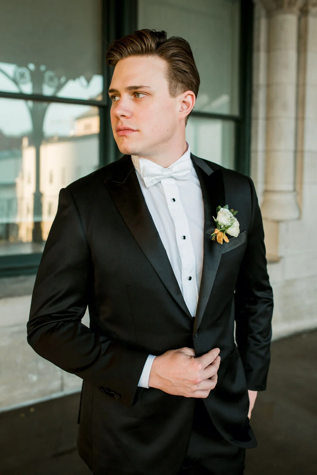 All white and greenery winter wedding flowers for a black tie wedding. Nashville wedding florist, Rosemary & Finch, at Union Station Hotel.