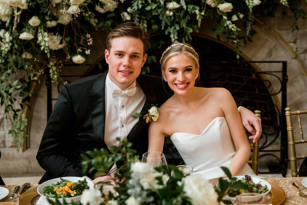 All white and greenery winter wedding flowers for a black tie wedding. Nashville wedding florist, Rosemary & Finch, at Union Station Hotel.
