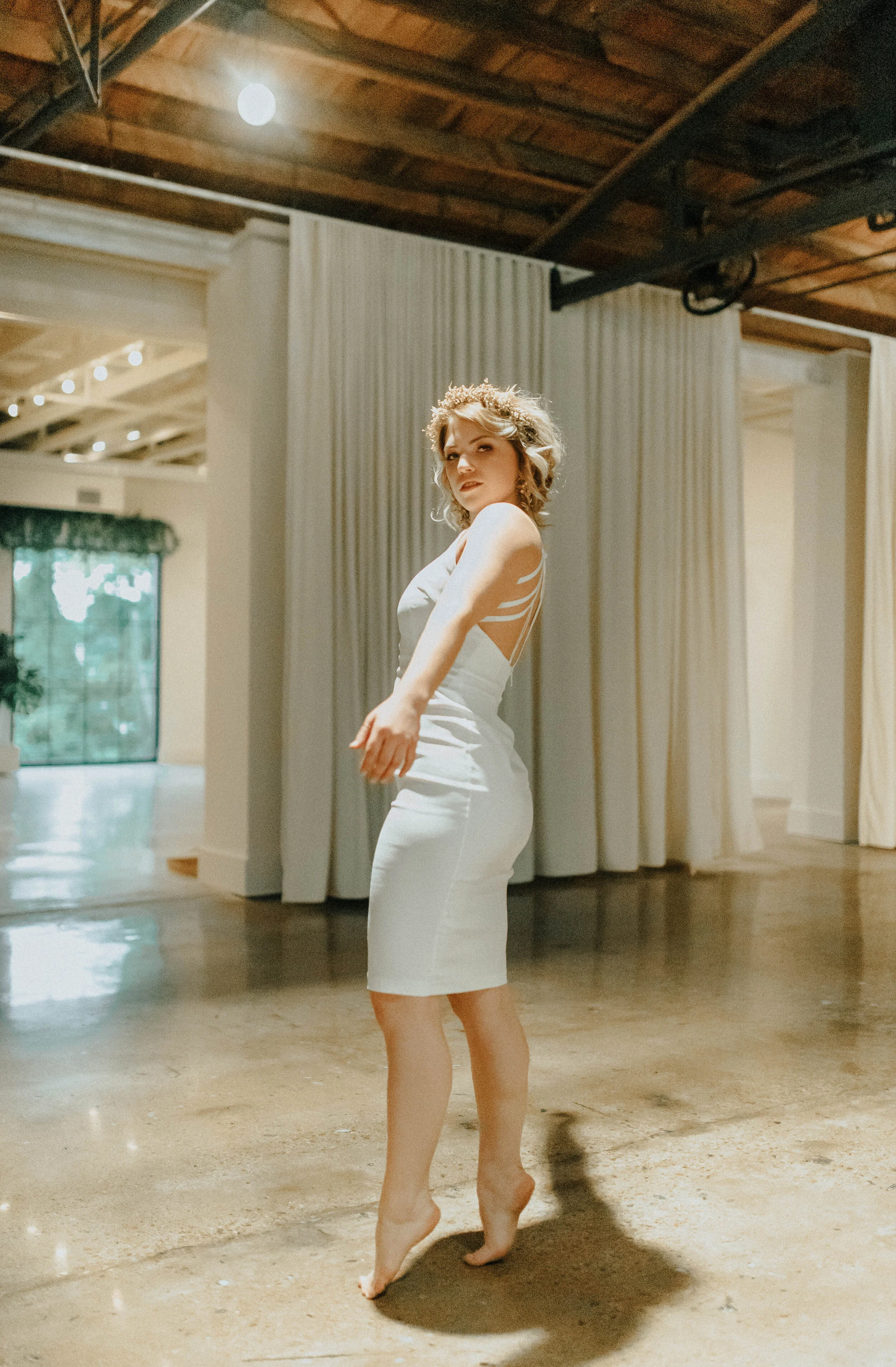 Earthy neutral floral design with flower crown, earrings, and wearable florals. Nashville wedding florist at the Saint Elle.