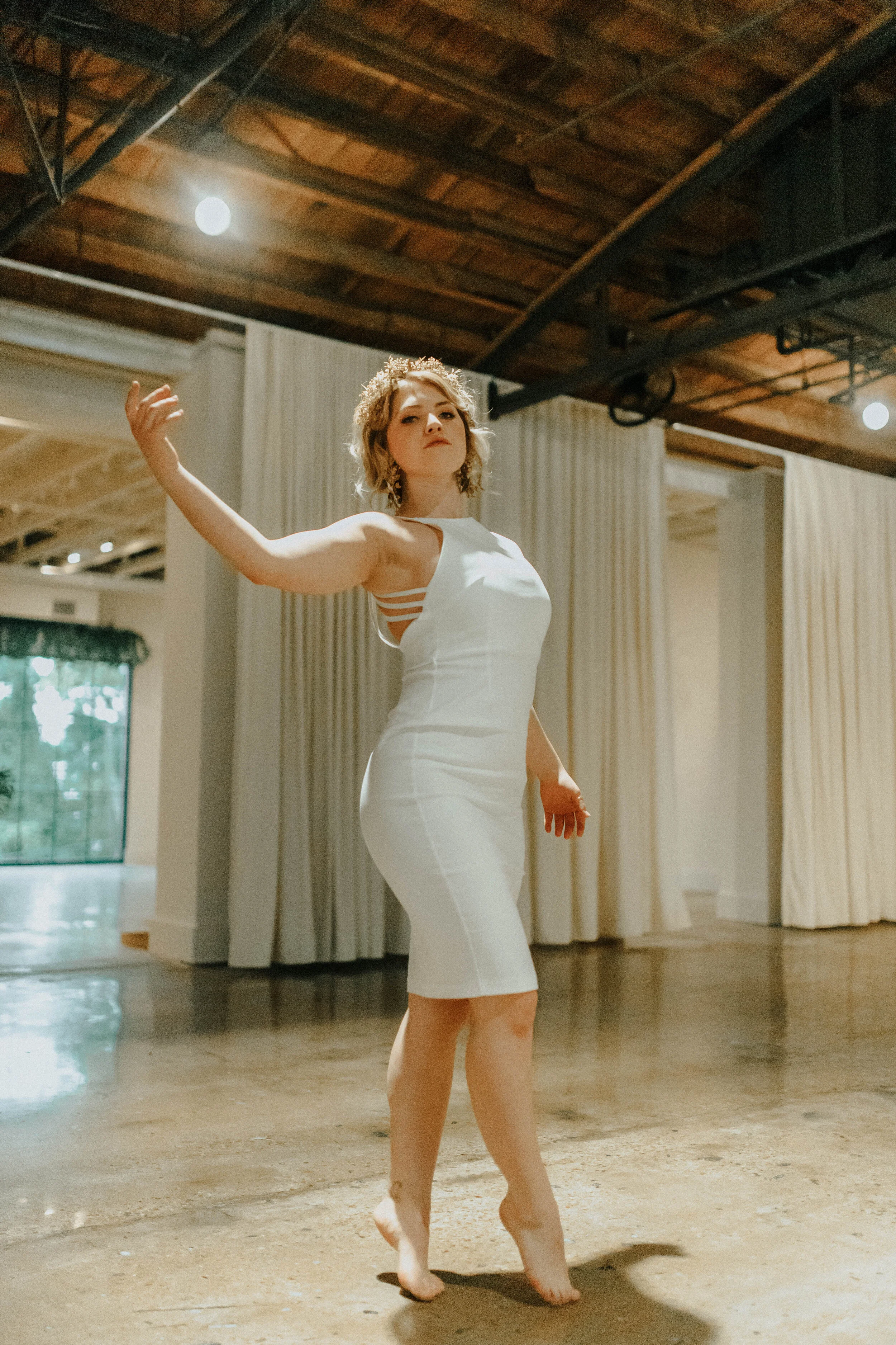 Earthy neutral floral design with flower crown, earrings, and wearable florals. Nashville wedding florist at the Saint Elle.