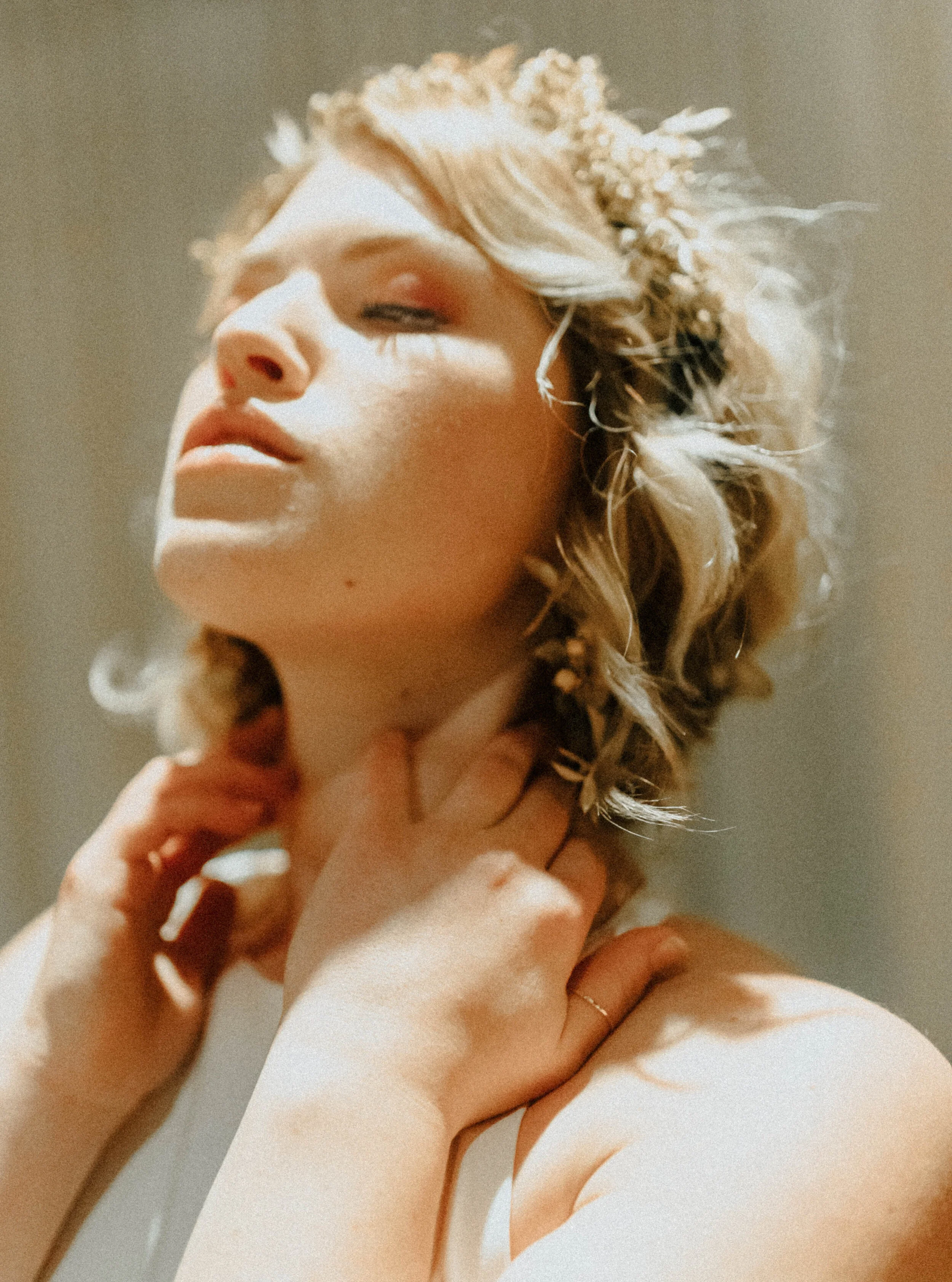 Earthy neutral floral design with flower crown, earrings, and wearable florals. Nashville wedding florist at the Saint Elle.